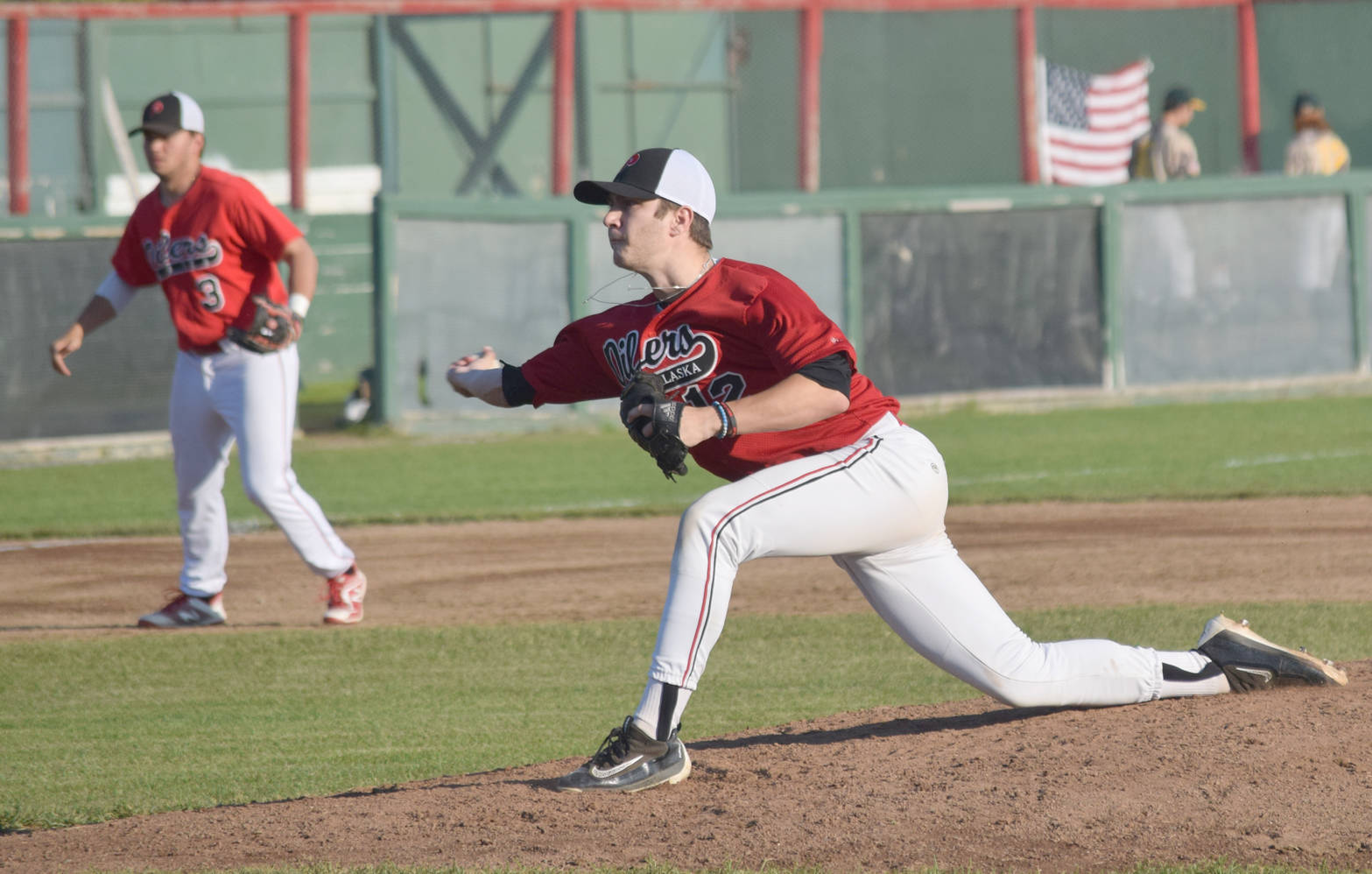 Oilers reliever Matt Amrhein drops down to deliever sidearm against the Mat-Su Miners on Friday, July 6, 2018, at Coral Seymour Memorial Park in Kenai. (Photo by Jeff Helminiak/Peninsula Clarion)