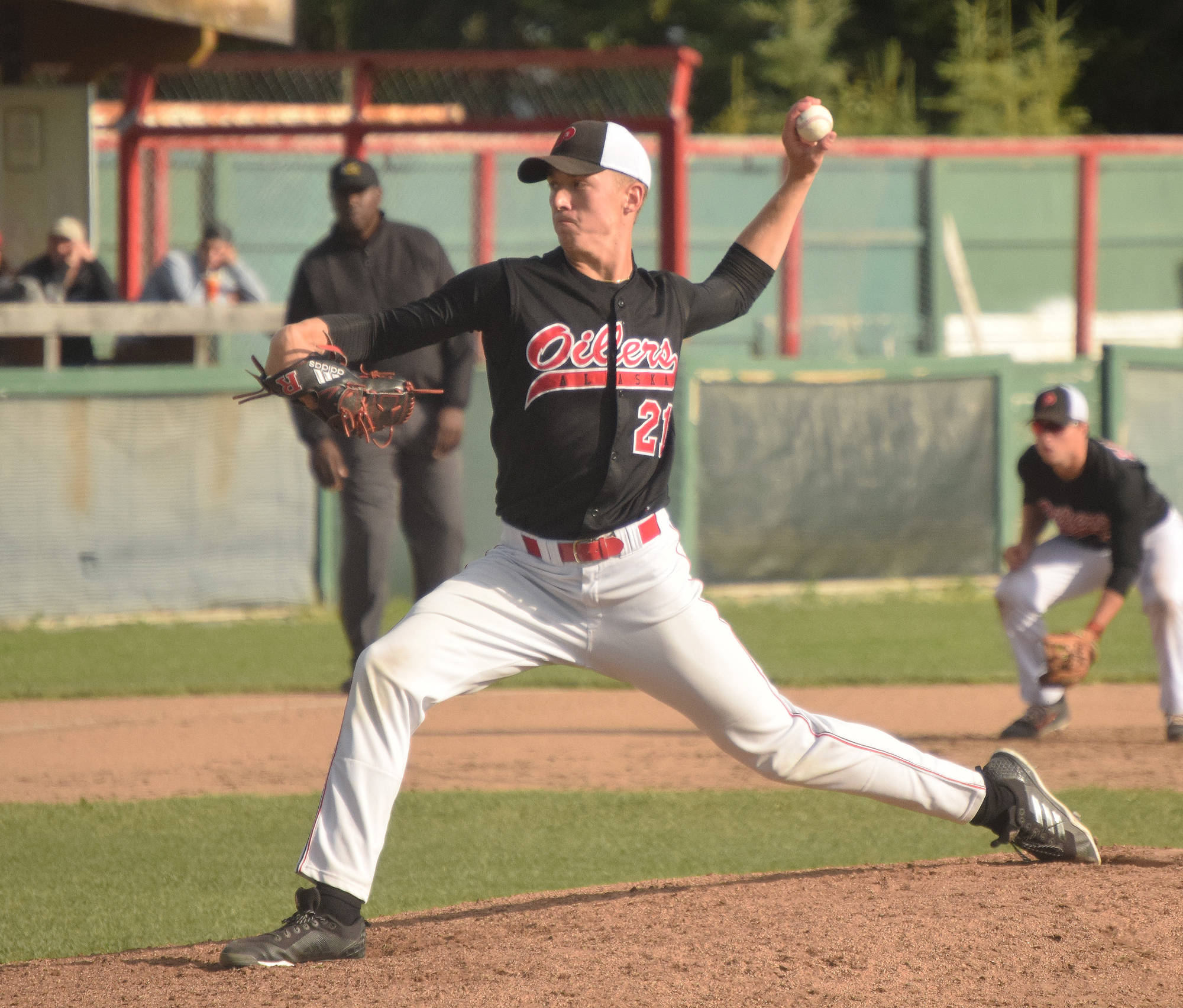 Peninsula Oilers starter Tevin Murray offers up a pitch Friday against the Anchorage Glacier Pilots at Coral Seymour Memorial Park in Kenai. (Photo by Joey Klecka/Peninsula Clarion)