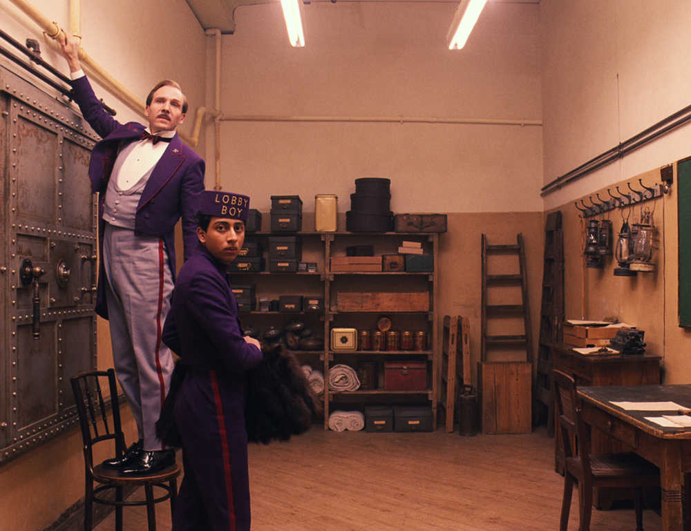 This image released by Fox Searchlight shows Ralph Fiennes, left, and Tony Revolori in "The Grand Budapest Hotel. (AP Photo/Fox Searchlight)