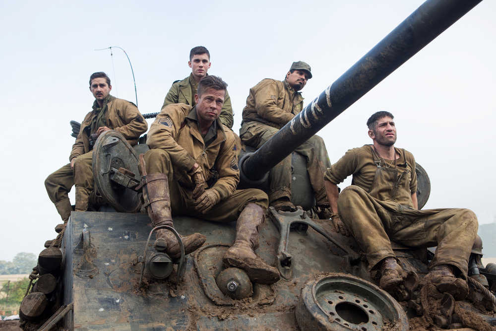 This photo released by Sony Pictures Entertainment shows, from left, Shia LaBeouf as Boyd Swan, Logan Lerman as Norman, Brad Pitt as Sgt. Don Collier, Michael Pena as Trini Garcia, and Jon Bernthal as Grady Travis, in Columbia Pictures' "Fury."  (AP Photo/Sony Pictures Entertainment, Giles Keyte)