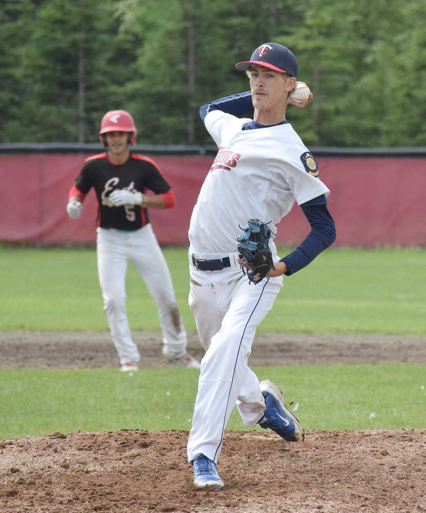 Photo by Joey Klecka/Peninsula Clarion Post 20 Twins pitcher Tyler Covey winds up for the toss against East Anchorage Wednesday afternoon at the Bill Miller Big Fish Wood Bat tournament at the Kenai Little League fields.