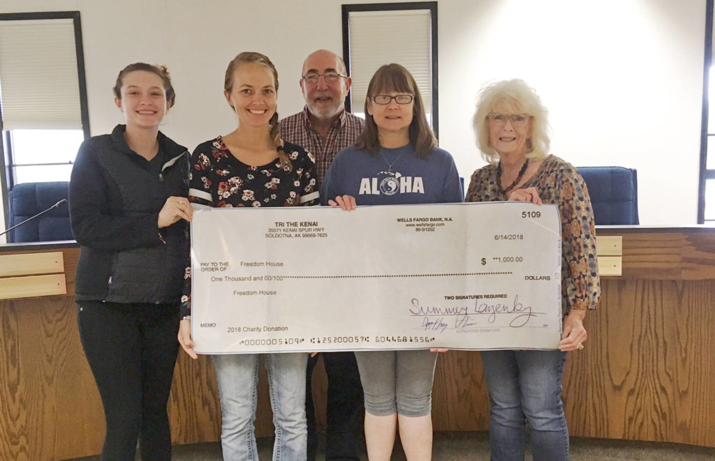 Tri the Kenai donates $1,000 to Freedom House | Peninsula Clarion