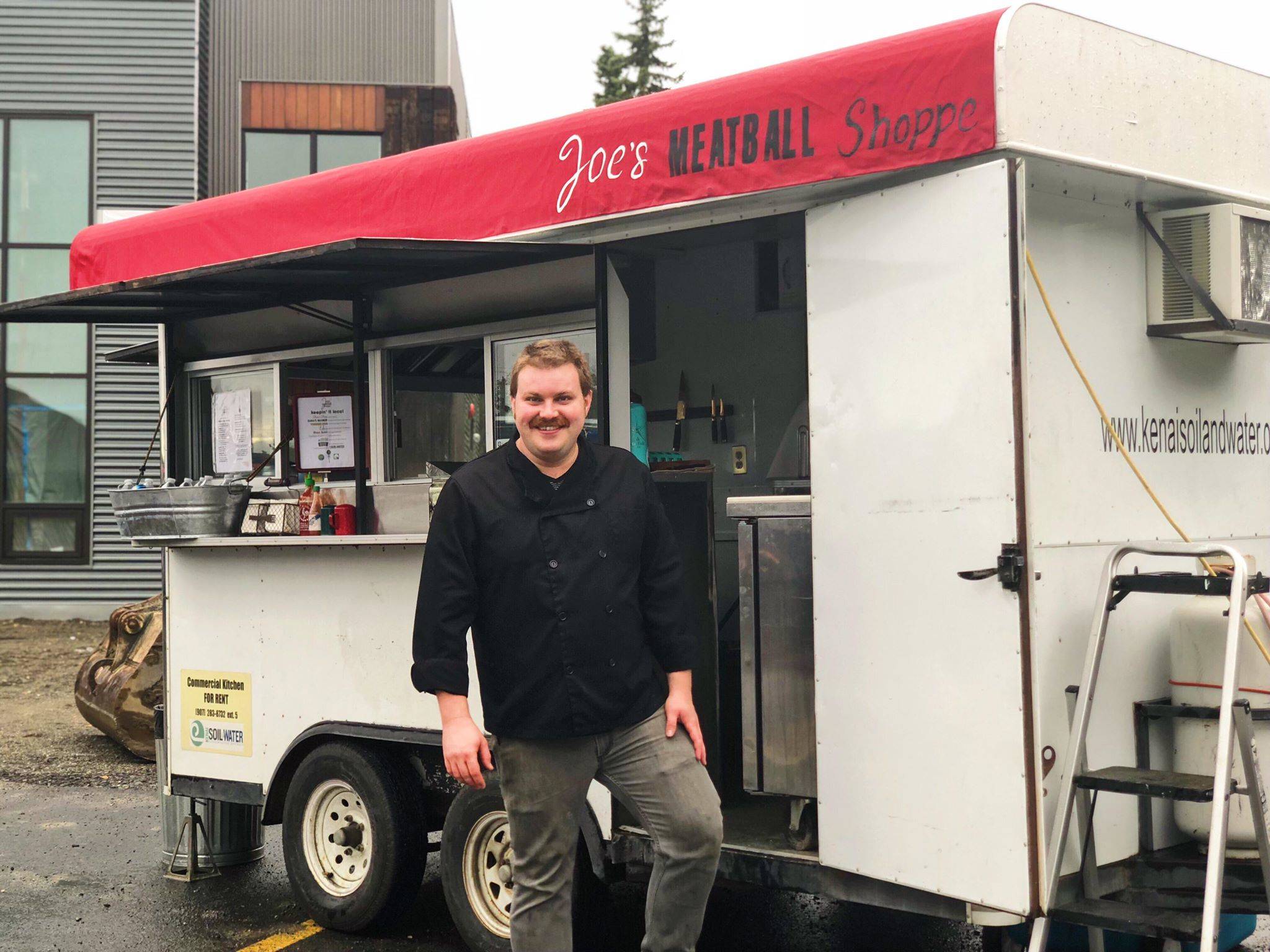 Joe Spady stands in front of his food truck, Joe’s Meatball Shoppe, on Sunday, Aug. 26, 2018, in Soldotna, Alaska. Spady rents his truck through Kenai Soil and Water Conservation District, who offers the converted trailer for people interested in a test kitchen and small business development, with a focus on Alaska grown products. (Photo by Victoria Petersen/Peninsula Clarion)