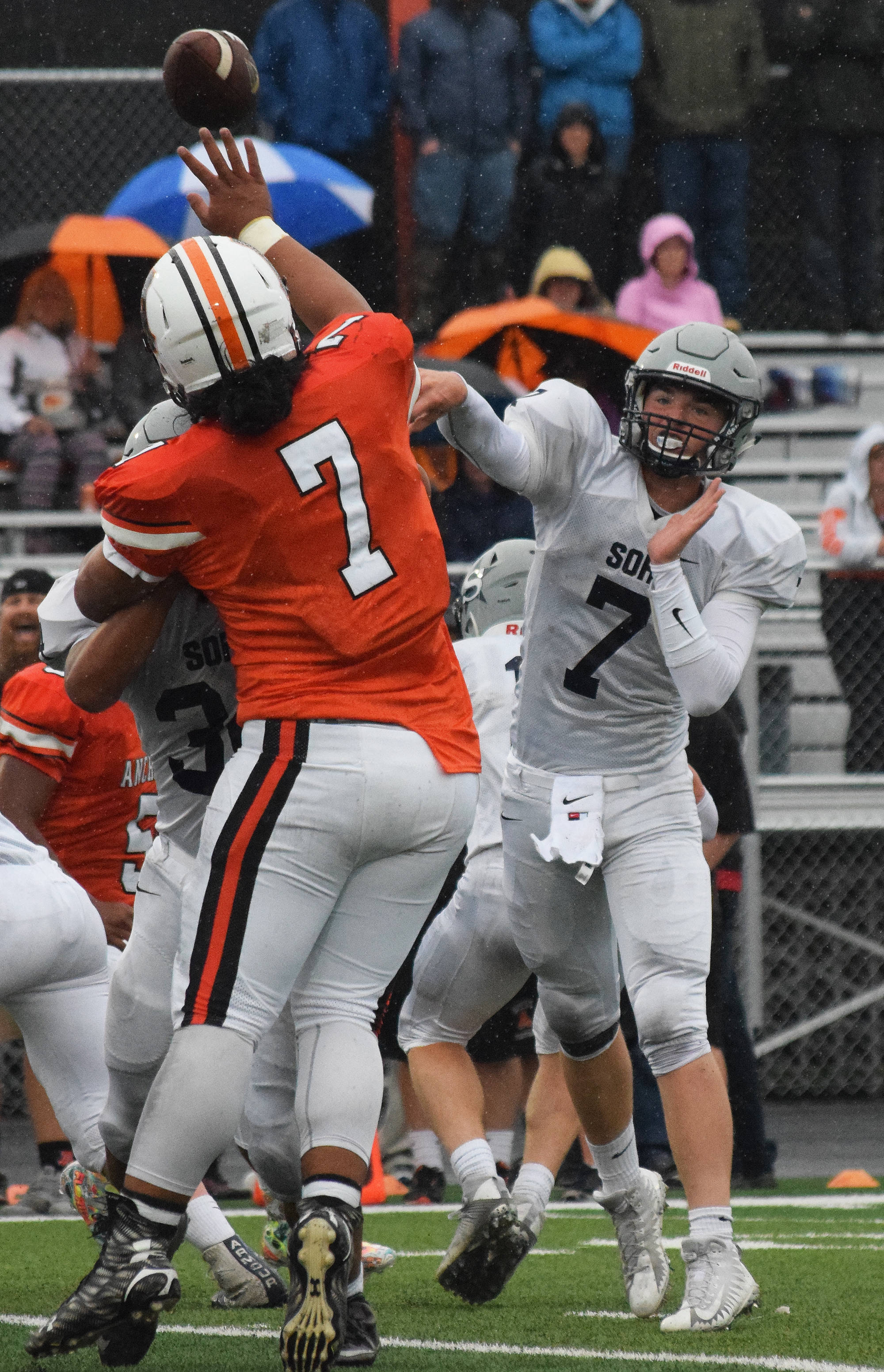 Soldotna quarterback Brandon Crowder unleashes a throw against the West Eagles defense Friday at West Anchorage High School. (Photo by Joey Klecka/Peninsula Clarion)