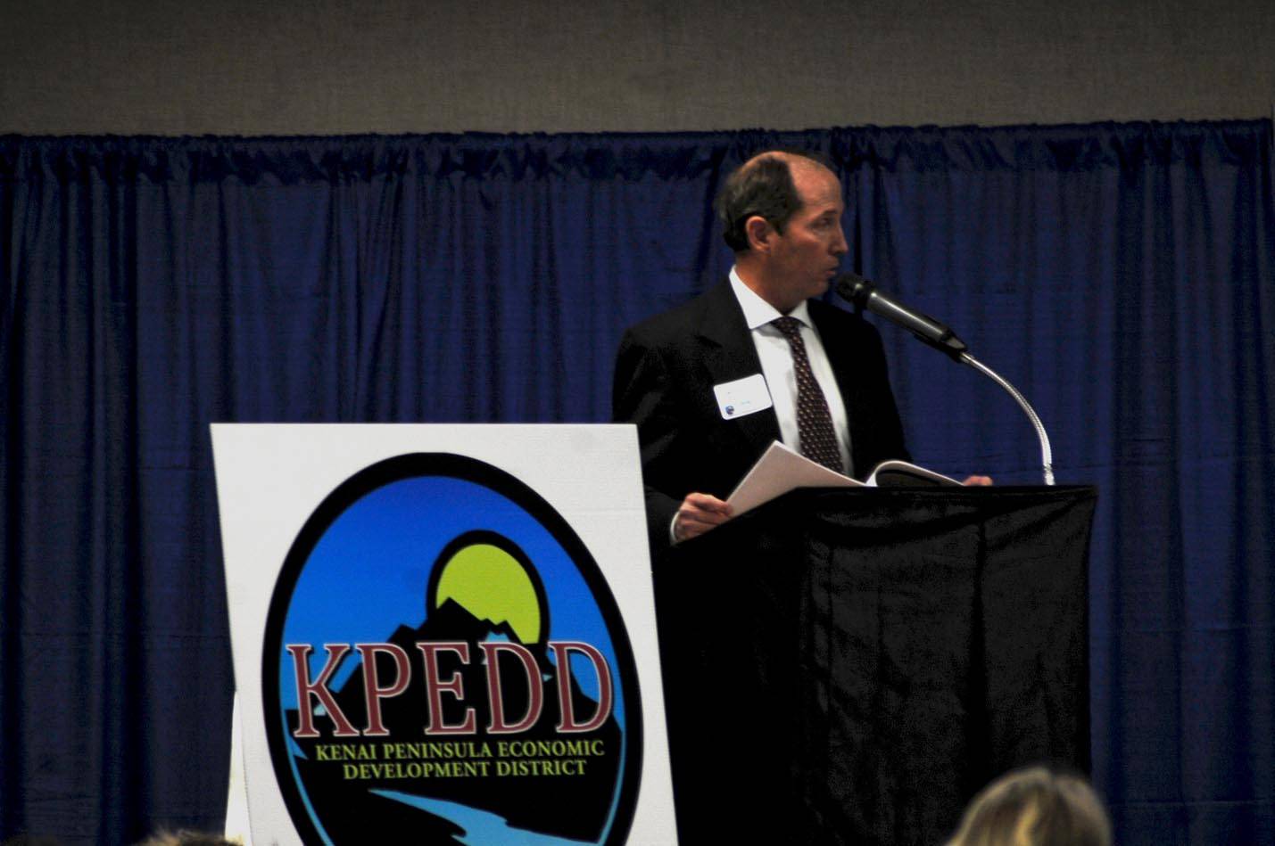 Mike Navarre, commissioner of the Alaska Department of Commerce, Community and Economic Development, speaks about the need for a stable fiscal plan for the state to the attendees at the Kenai Peninsula Economic Development District’s Industry Outlook Forum on Wednesday, Jan. 10, 2018 in Soldotna, Alaska. (Photo by Elizabeth Earl/Peninsula Clarion)