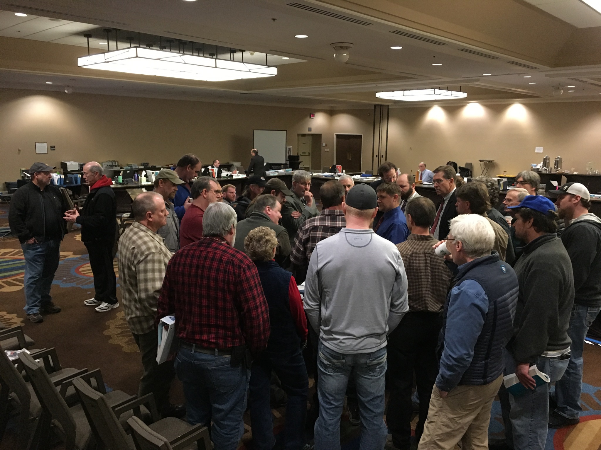 Attendees of various user groups crowd near the front of the room during a break at the Board of Fisheries’ Upper Cook Inlet meeting Tuesday, Feb. 28, 2017 in Anchorage, Alaska. (DJ Summers/Alaska Journal of Commerce)