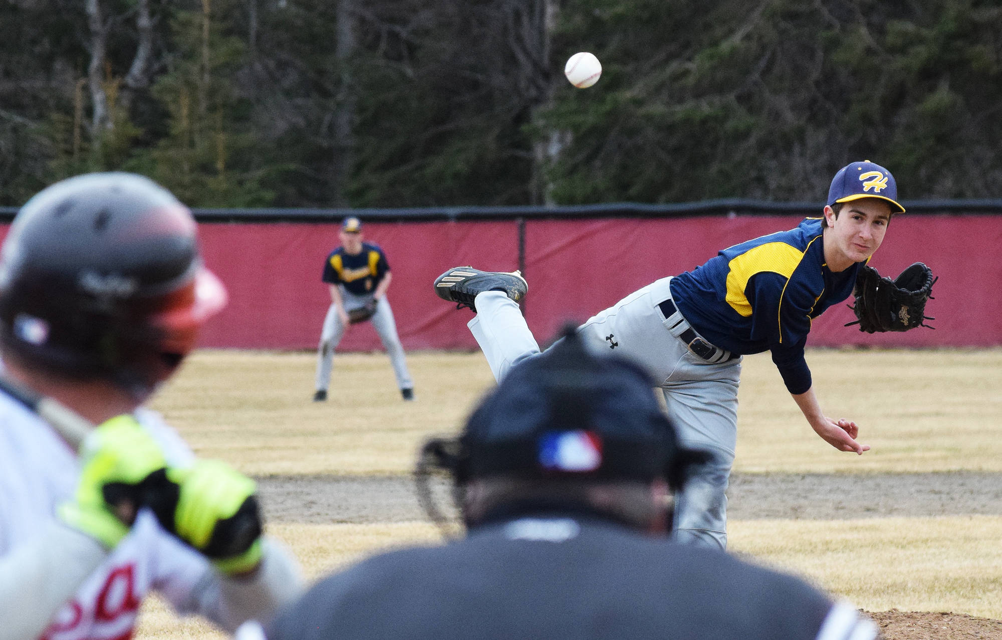 Homer’s Joe Ravin offers up a pitch to a Kenai Central batter May 2, 2017, at the Kenai Little League Fields. (Photo by Joey Klecka/Peninsula Clarion)