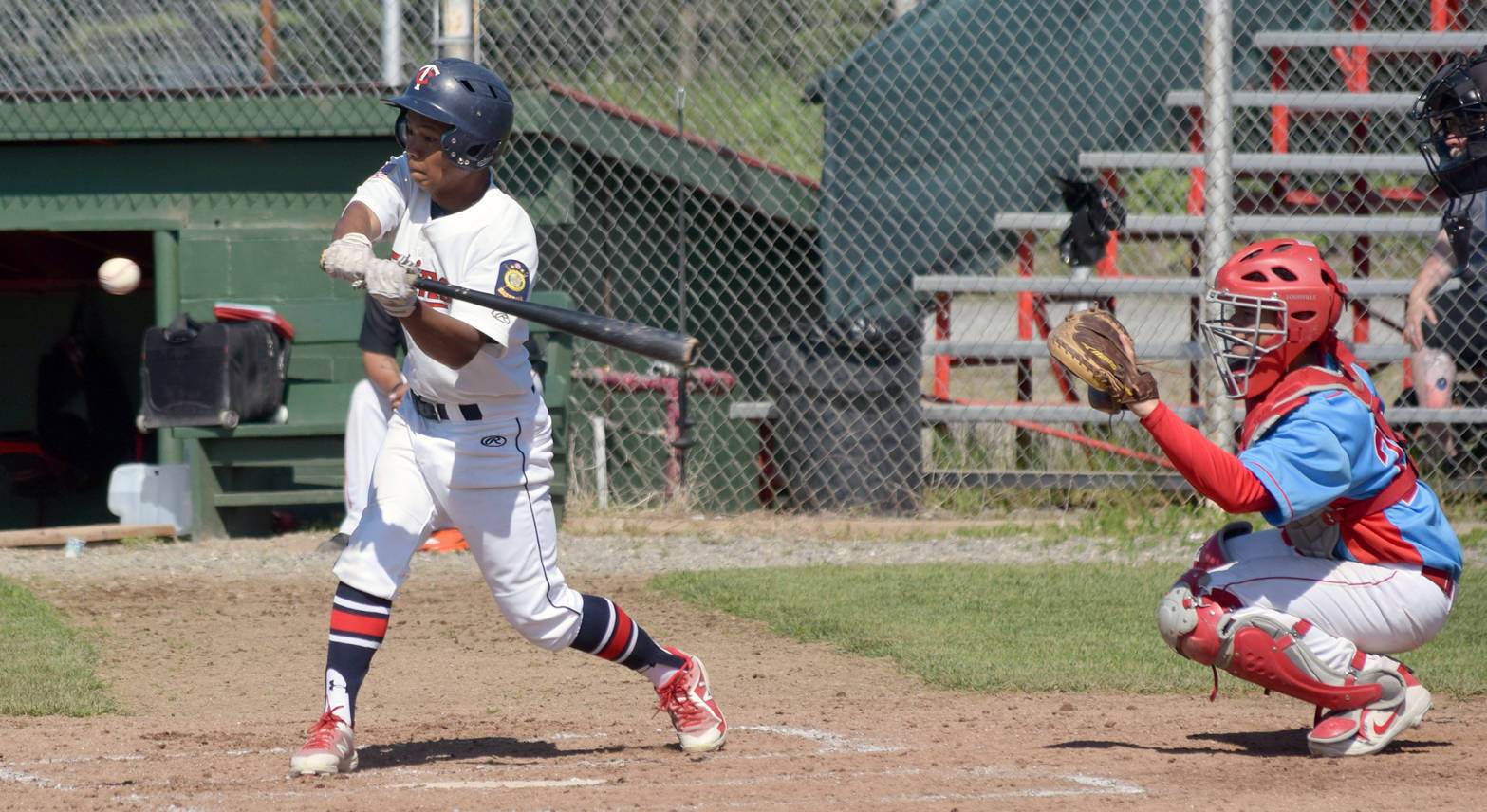 Harold Ochea of the Twins takes a cut at the ball Wednesday, July 5, 2018, at Coral Seymour Memorial Park in Kenai. (Photo by Jeff Helminiak/Peninsula Clarion)