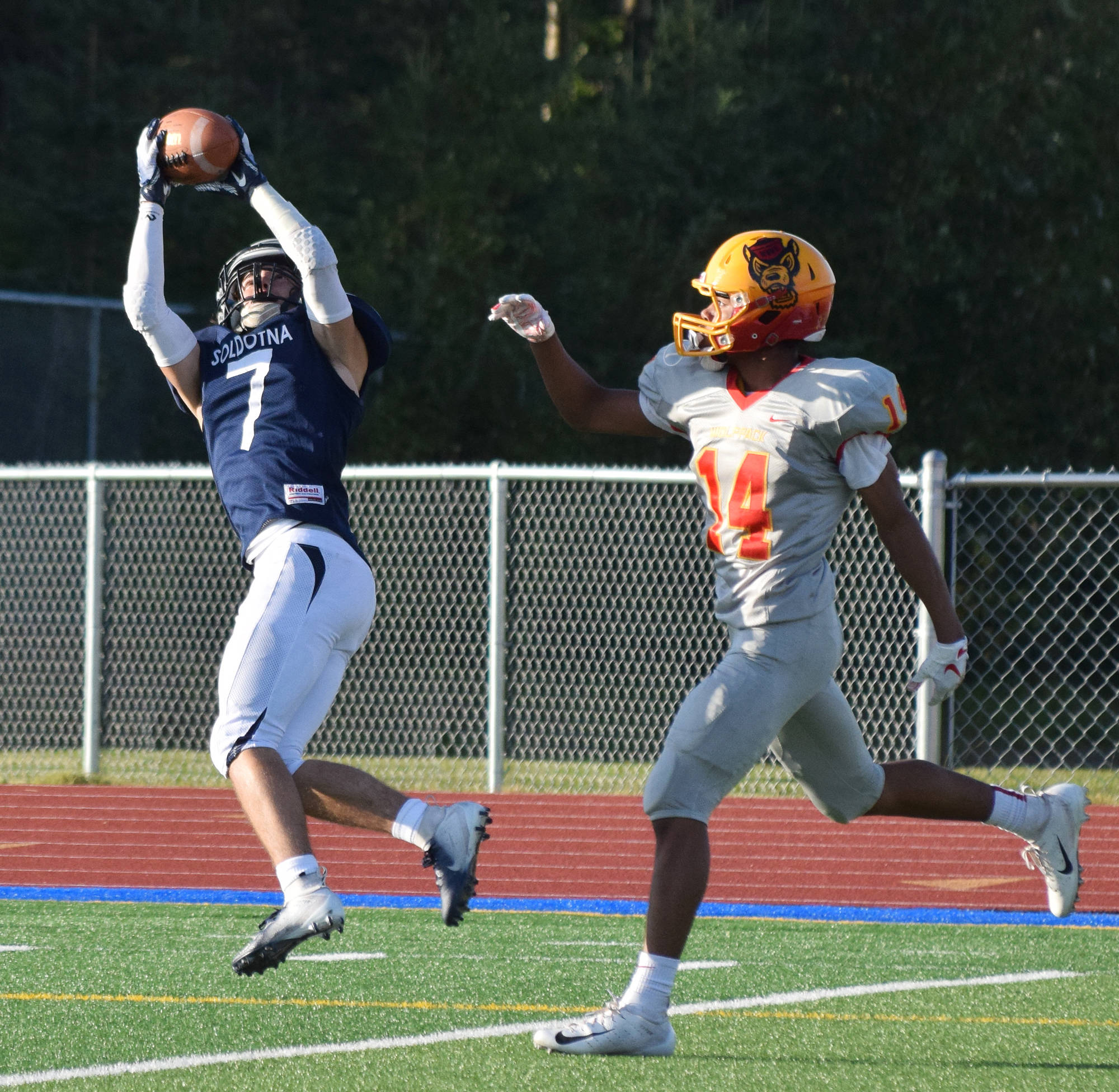 Soldotna junior Wyatt Medcoff (7) intercepts a pass intended for West Valley receiver Avery Weston, Friday at Justin Maile Field in Soldotna. (Photo by Joey Klecka/Peninsula Clarion)