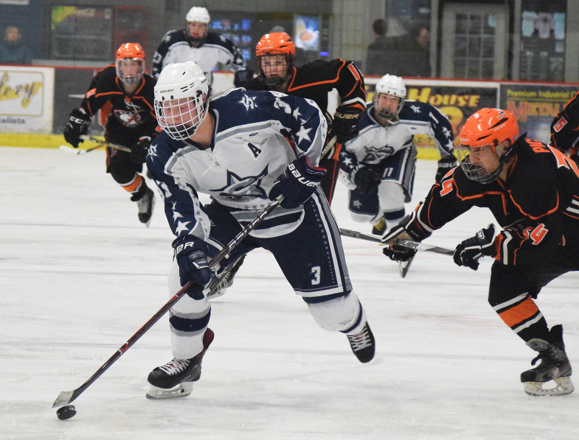 Soldotna sophomore Galen Brantley III breaks away for a shot at the West Anchorage goaltender Jan. 20, 2018, at the Soldotna Regional Sports Complex. (Photo by Joey Klecka/Peninsula Clarion)