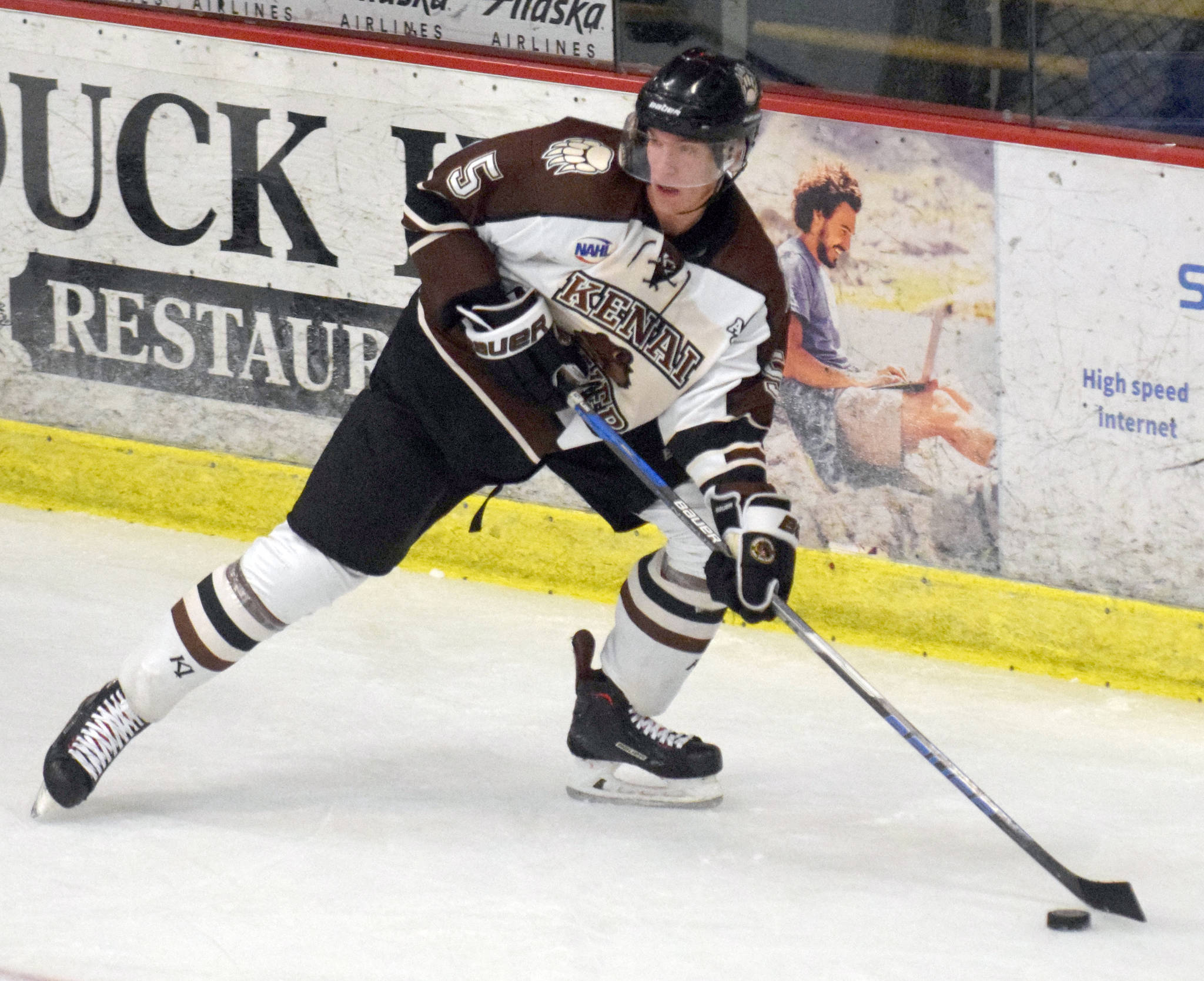 Kenai River Brown Bears defenseman Johan Bok moves the puck against the Chippewa Steel on Oct. 5, 2018, at the Soldotna Regional Sports Complex. (Photo by Jeff Helminiak/Peninsula Clarion)