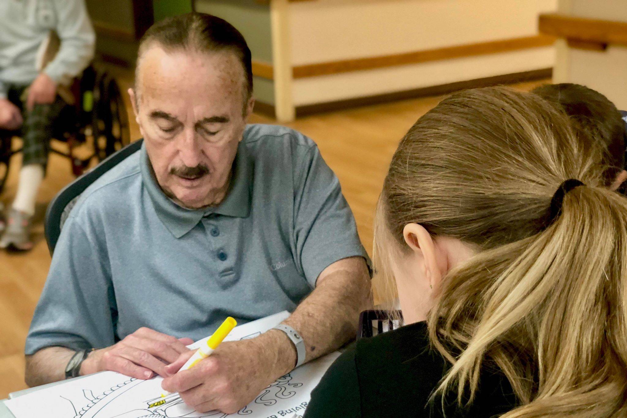 Students work with Heritage Place residents to spread Thanksgiving cheer