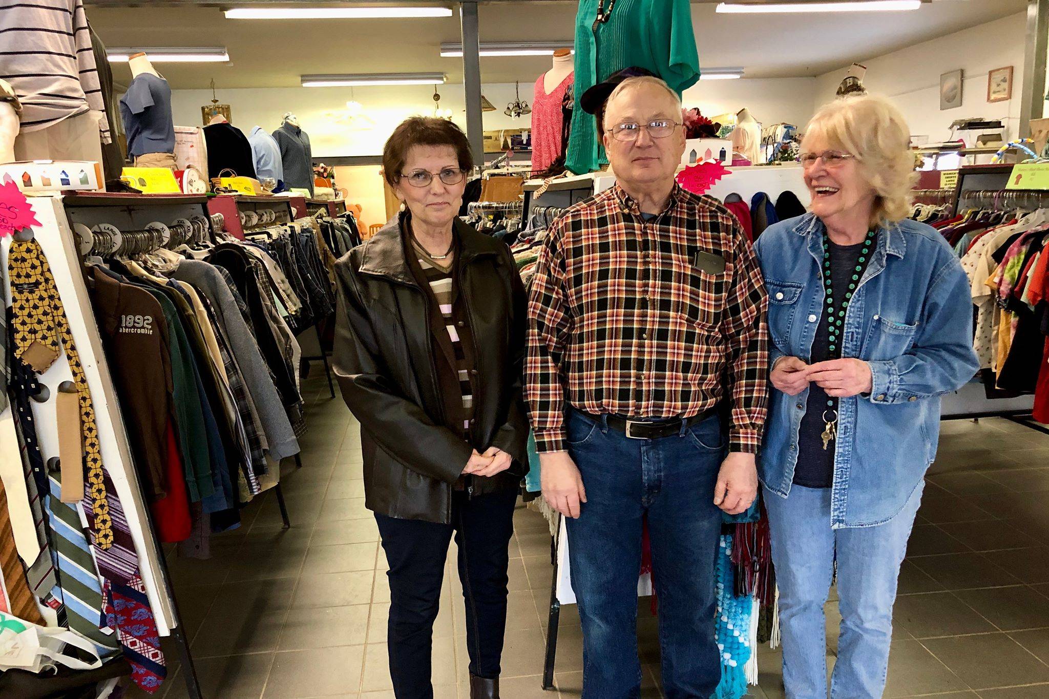 From left, board members Jackie Swanson and Alex Zerbinos and manager Jean Warrick pose at Bishop’s Attic in Soldotna on Friday. The thrift shop has seen an increase in donations and uses the items to give back to the community. (Photo by Victoria Petersen/Peninsula Clarion)