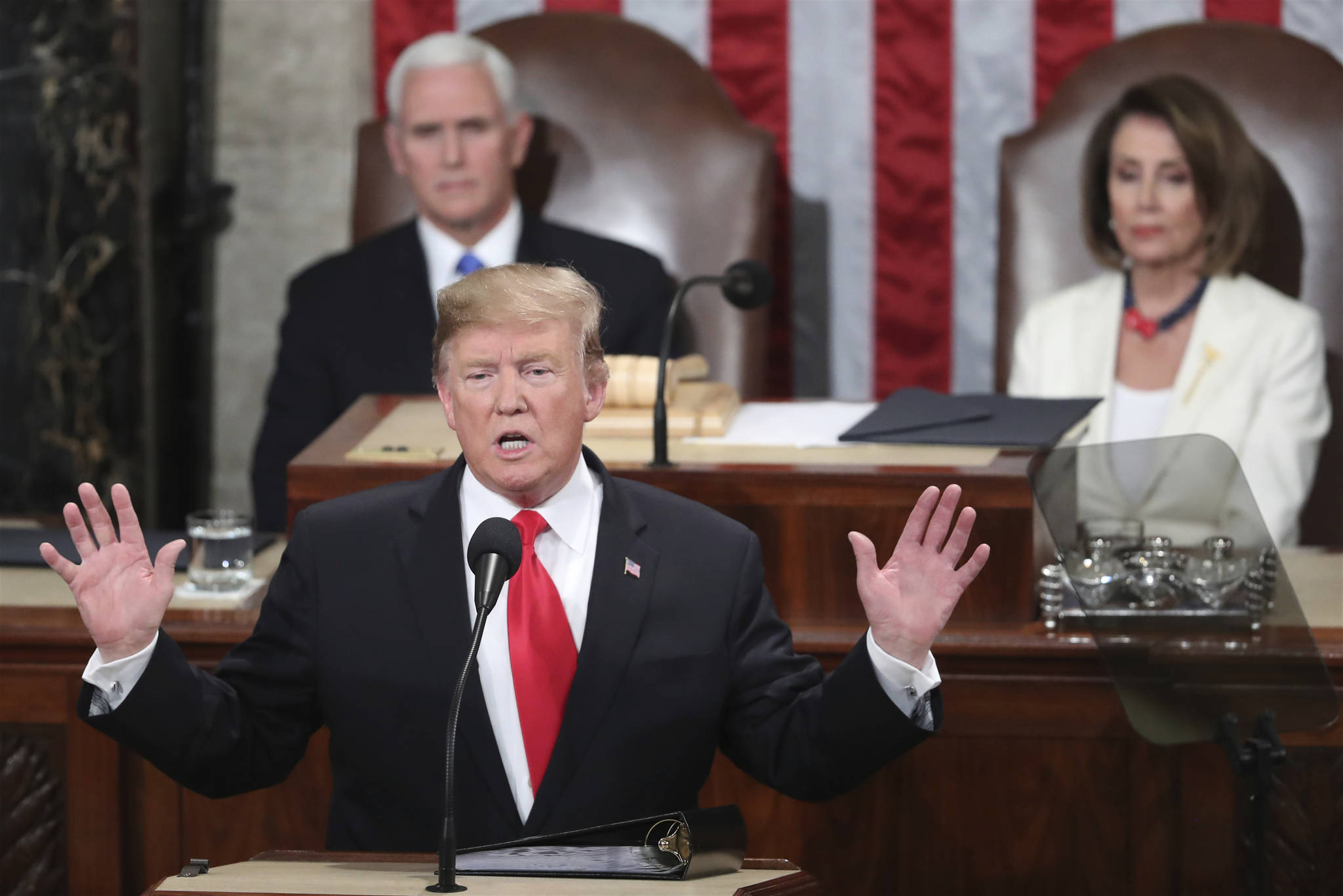 President Donald Trump delivers his State of the Union address to a joint session of Congress on Capitol Hill in Washington, as Vice President Mike Pence and Speaker of the House Nancy Pelosi, D-Calif., watch, Tuesday. (AP Photo/Andrew Harnik)