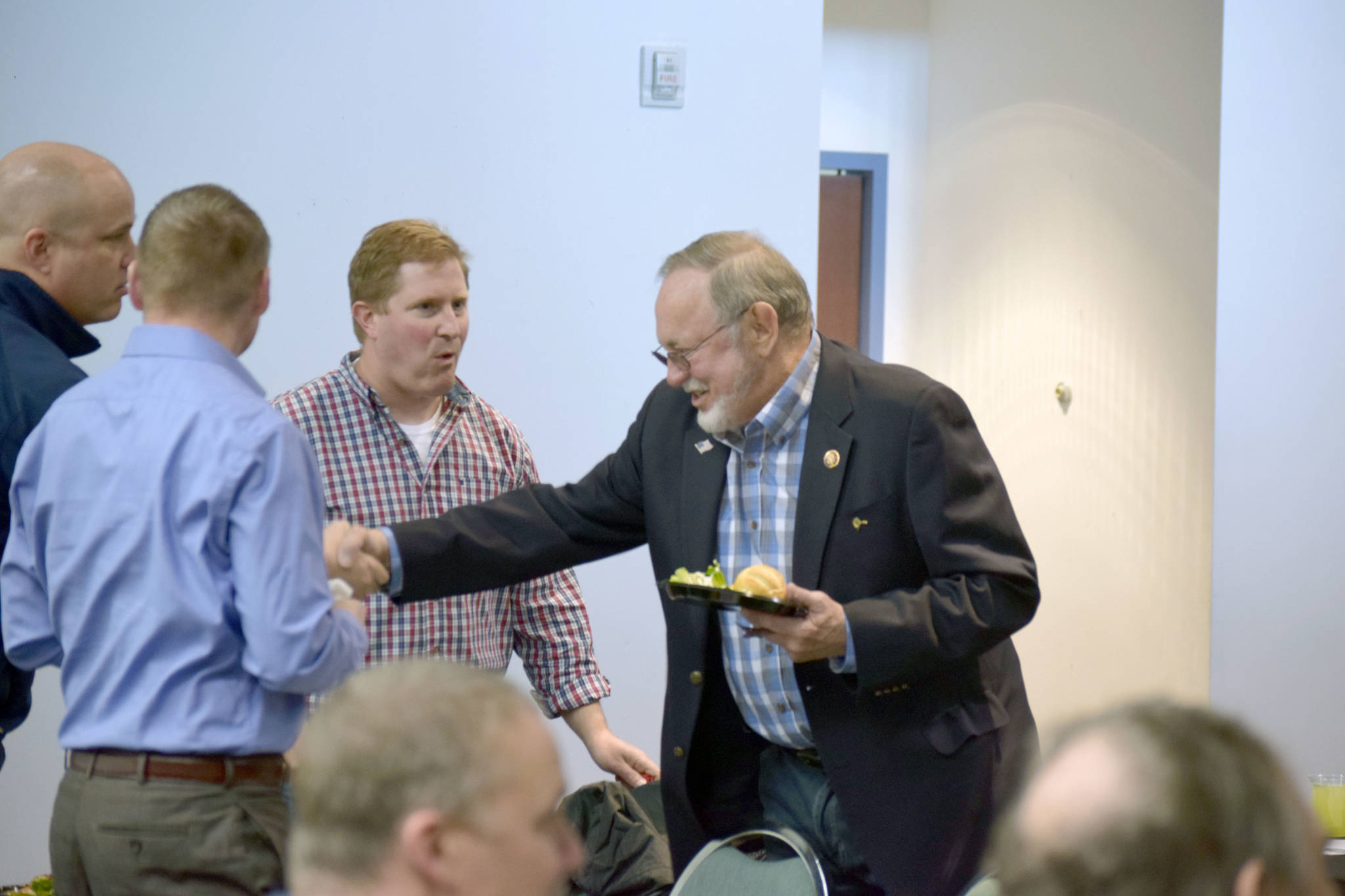 Don Young shakes hands with members of the Kenai and Soldotna Chambers of Commerce during a luncheon at the Kenai Visitors Center in Kenai, Alaska on Tuesday, April 23, 2019. (Photo by Brian Mazurek/Peninsula Clarion)