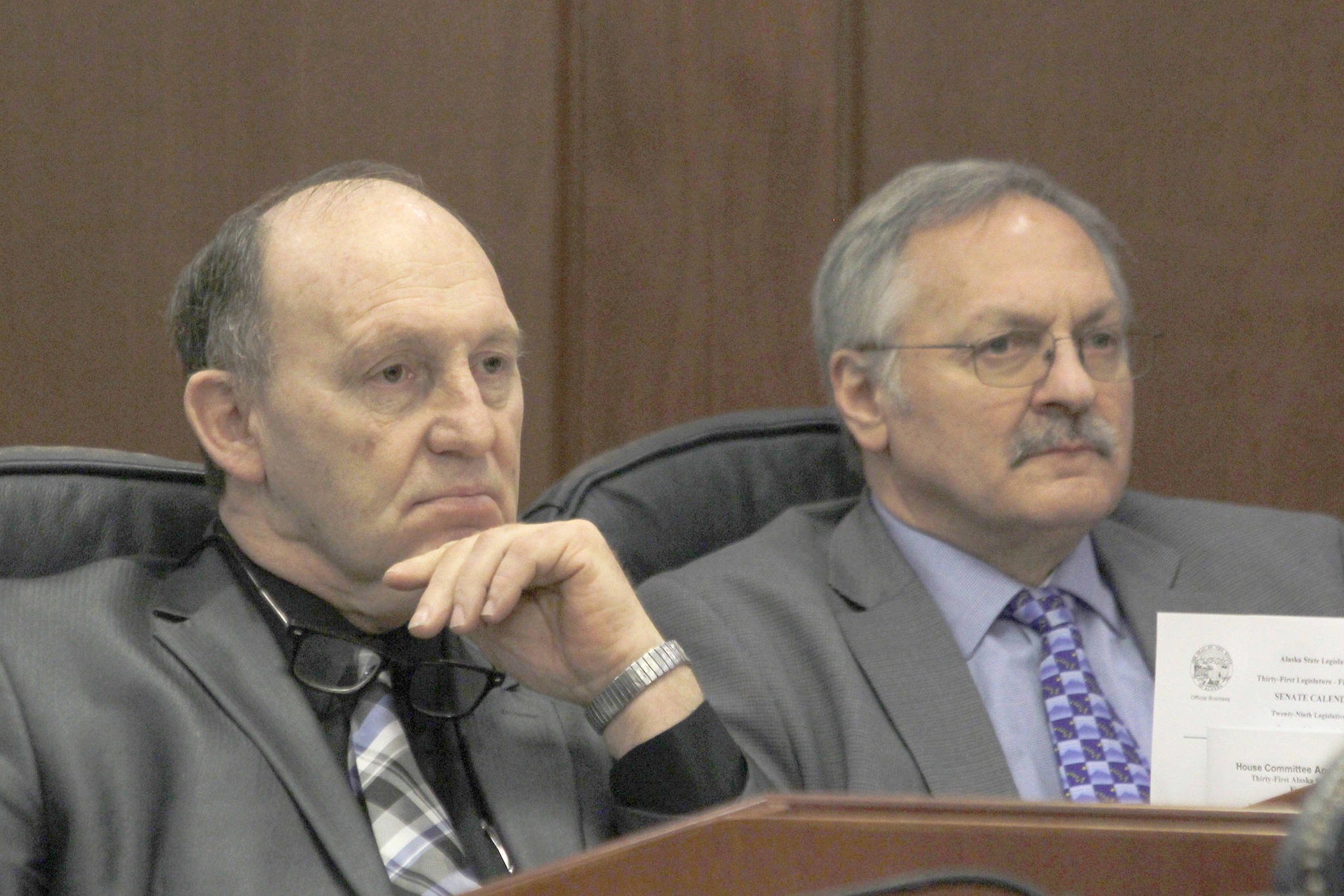 Rep. Gary Knopp, R-Kenai, and Rep. Dave Talerico, R-Healy, sit next to each other after Knopp voted not to confirm Talerico as Speaker of the House on Tuesday. (Alex McCarthy | Juneau Empire)