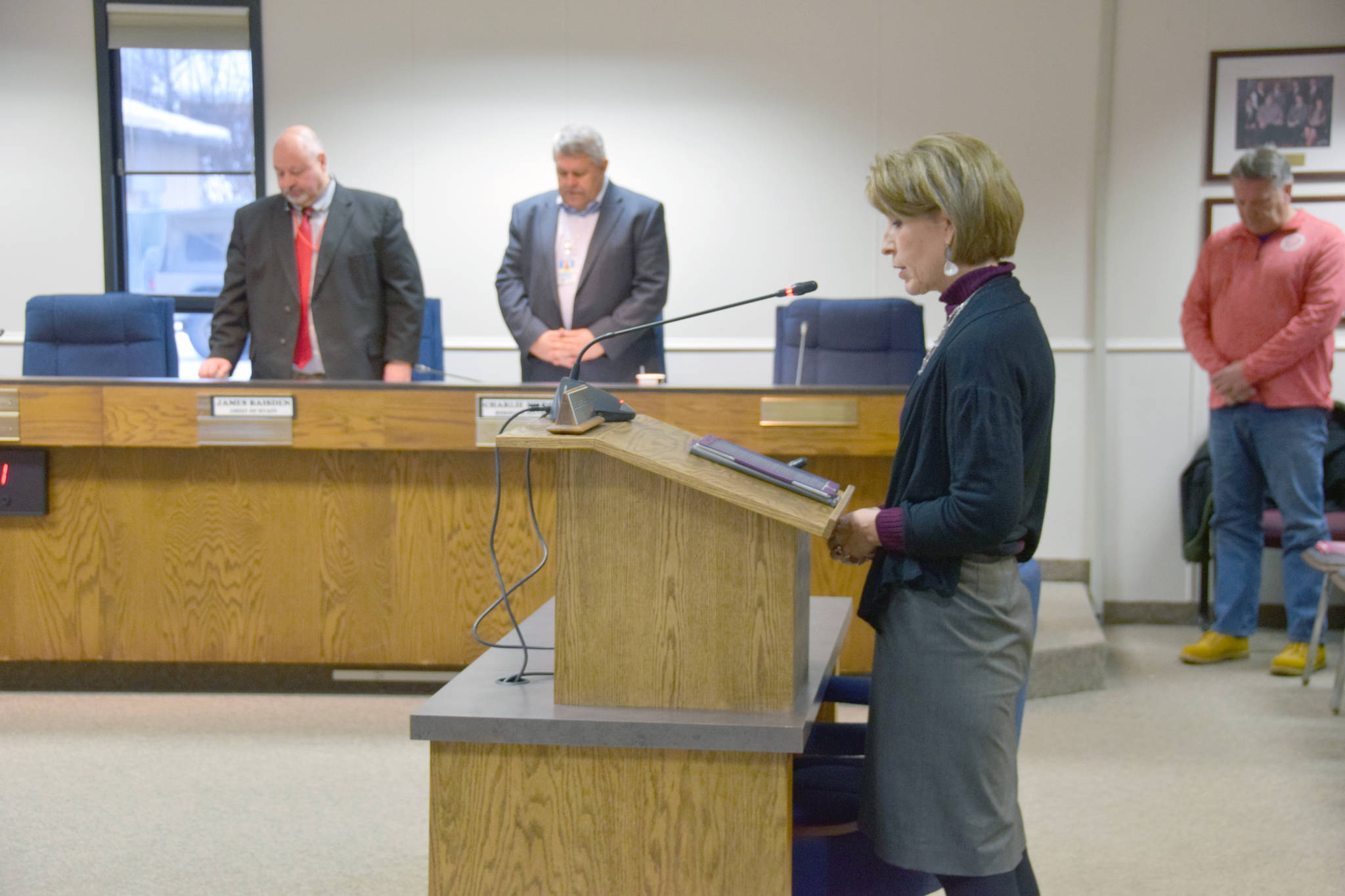 Brian Mazurek / Peninsula Clarion file                                Debbie Hamilton gives an invocation March 5 at the Kenai Peninsula Borough Assembly Meeting in Soldotna.