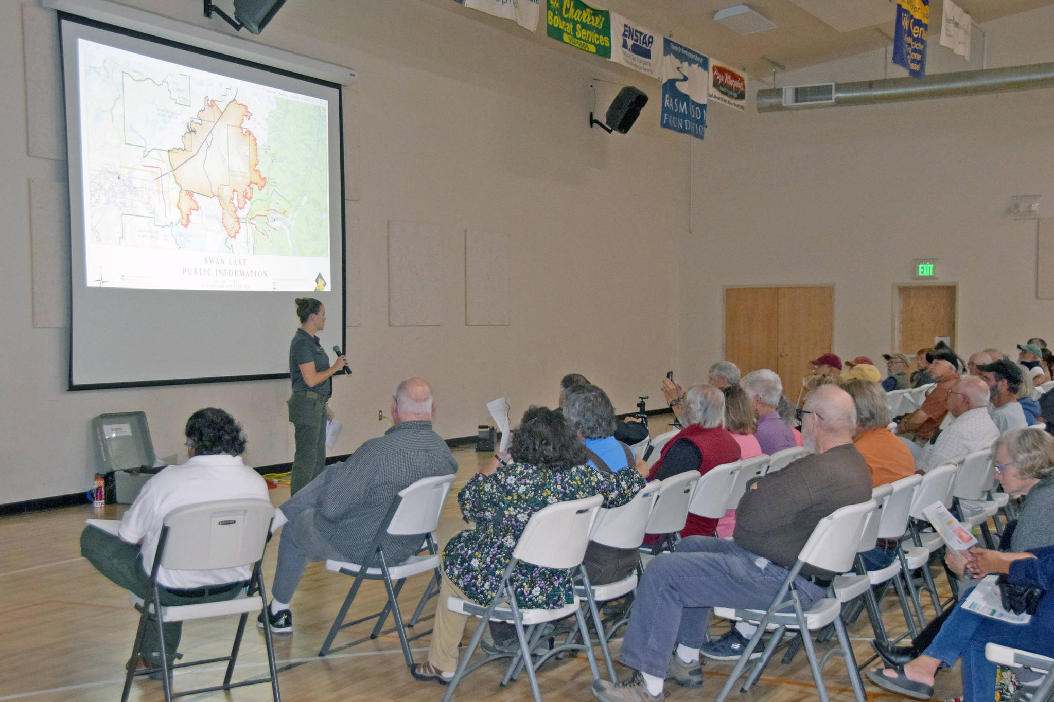 Residents attend a community meeting to discuss the Swan Lake Fire in Sterling, on Thursday. (Photo by Brian Mazurek/Peninsula Clarion)