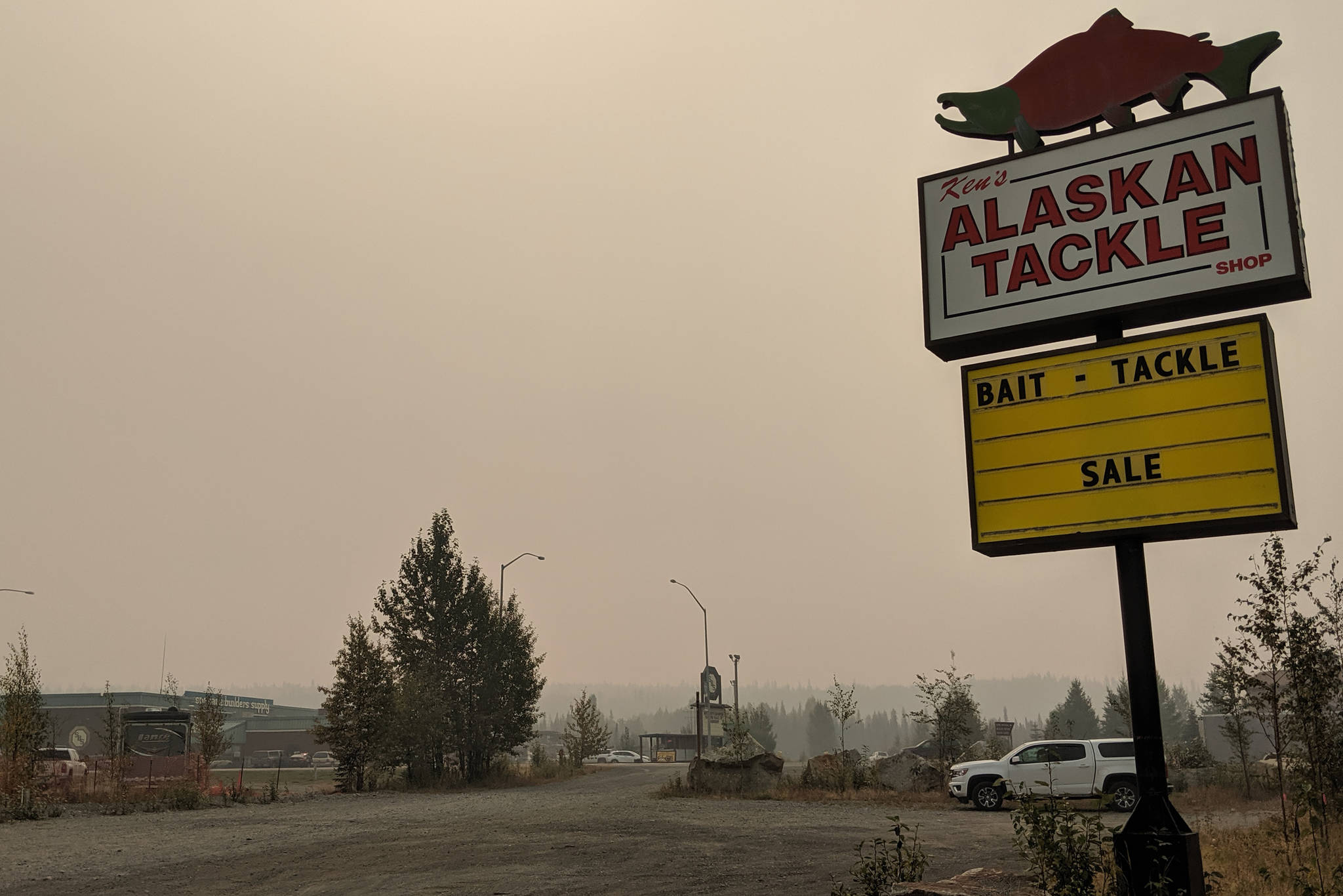 Erin Thompson / Peninsula Clarion                                Haze from Swan Lake Fire smoke can be seen over Kenai National Wildlife Refuge near the corner of the Sterling Highway and Funny River Road on Wednesday in Soldotna.