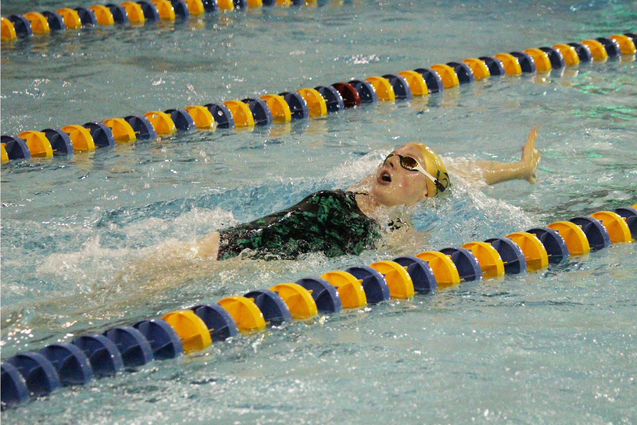 Seward’s Lydia Jacoby swims to first place in the girls 100 yard backstroke during the Homer Invite on Saturday, Sept. 7, 2019 at the Kate Kuhns Aquatic Center in Homer, Alaska. (Photo by Megan Pacer/Homer News)