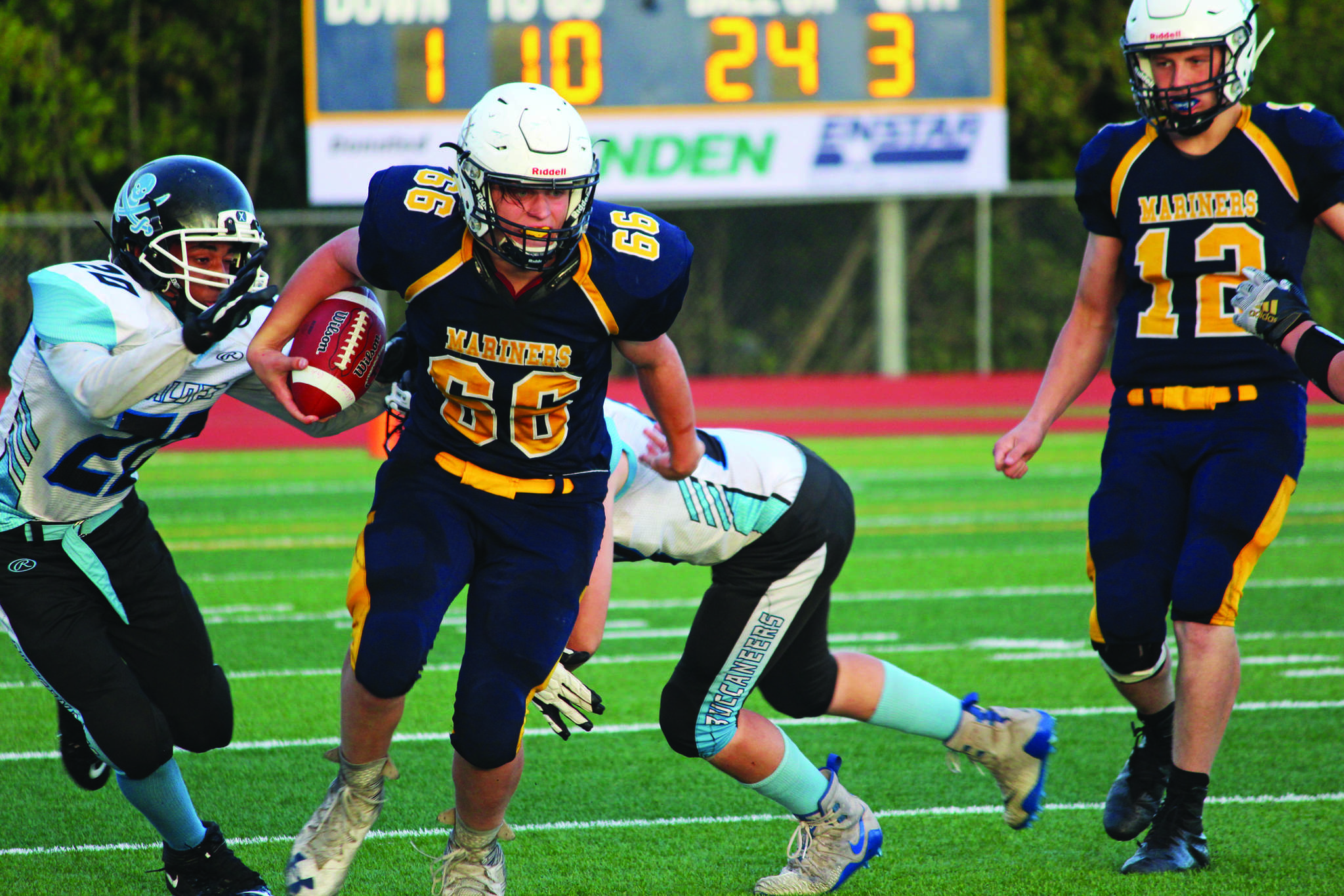 Homer’s River Mann takes the ball up the field during a Friday, Sept. 13, 2019 football game against Valdez High School on the Mariner field in Homer, Alaska. (Photo by Megan Pacer/Homer News)