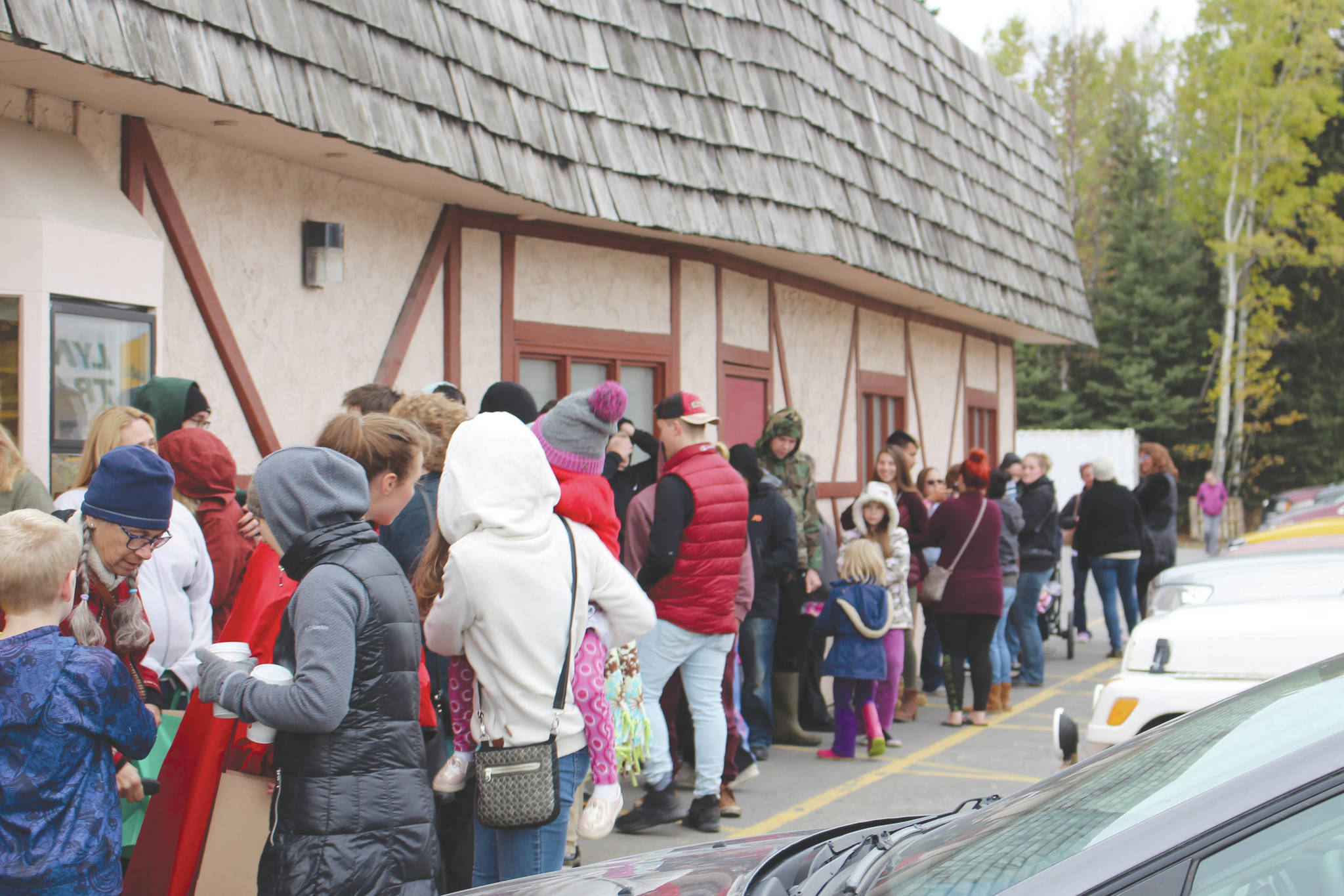 The line outside of the Moose is Loose Bakery can be seen here on their last day of business in Soldotna, Alaska on Sept. 28, 2019. (Photo by Brian Mazurek/Peninsula Clarion)