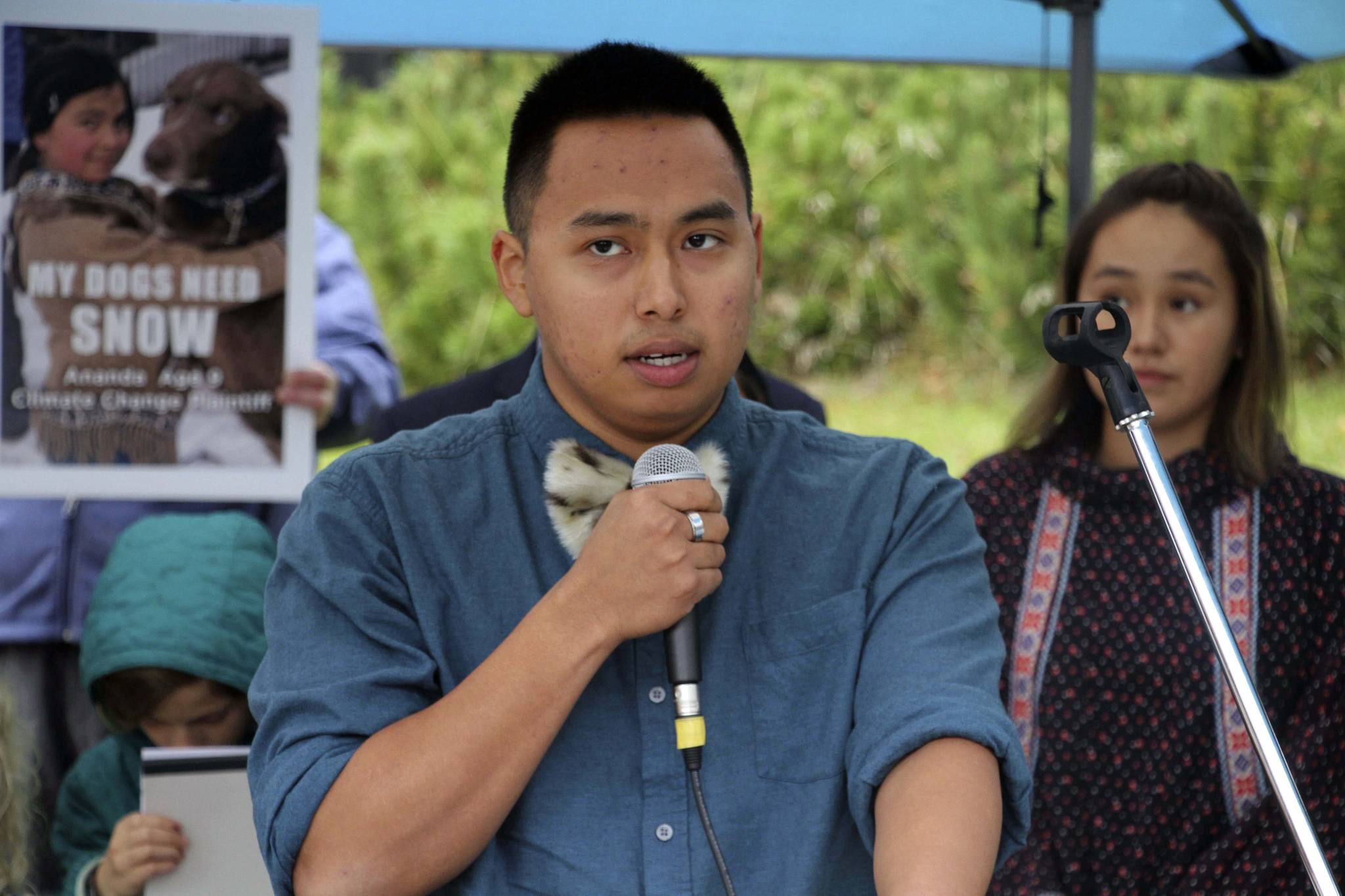 Esau Sinnok of Shishmaref, Alaska, speaks at a news conference after the Alaska Supreme Court heard arguments Wednesday, Oct. 9, 2019, in Anchorage, Alaska, in a lawsuit that claims state policy on fossil fuels is harming the constitutional right of young Alaskans to a safe climate. Sinnok and 15 other Alaska youths in 2017 sued the state, claiming that human-caused greenhouse gas emission leading to climate change is creating long-term, dangerous health effects. They lost in Superior Court, but appealed to Alaska’s highest court. (AP Photo/Mark Thiessen)