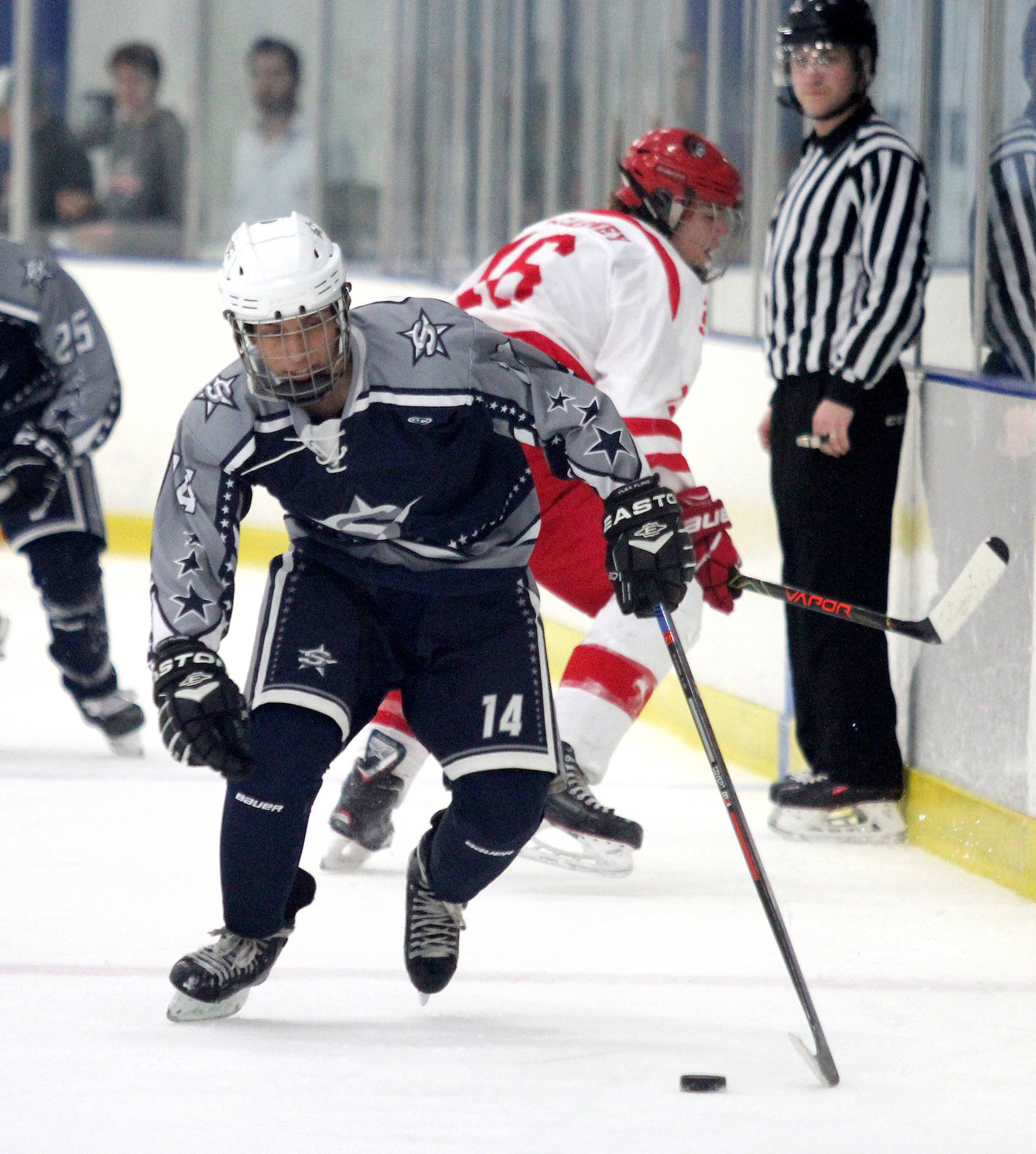 Soldotna’s Alex Montague skates the puck up the left wing during a 4-2 loss to Wasilla Friday, Nov. 8, 2019, at the MTA Events Center in Palmer. (Photo by Jeremiah Bartz/Mat-Su Frontiersman)