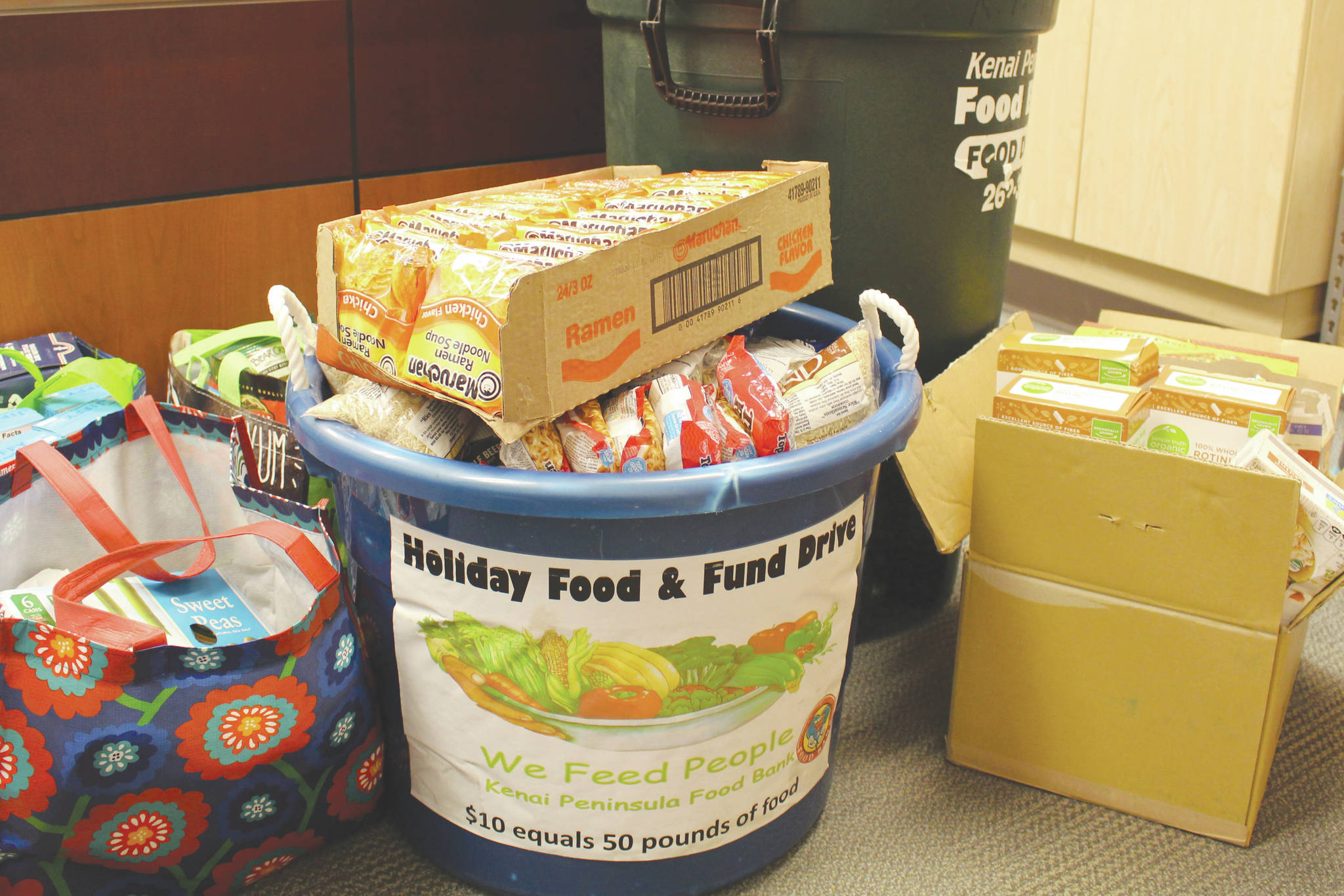 Food to be donated to the Kenai Peninsula Food Bank can be seen here at the Soldotna Public Library on Sept. 20, 2019. (Photo by Brian Mazurek/Peninsula Clarion)