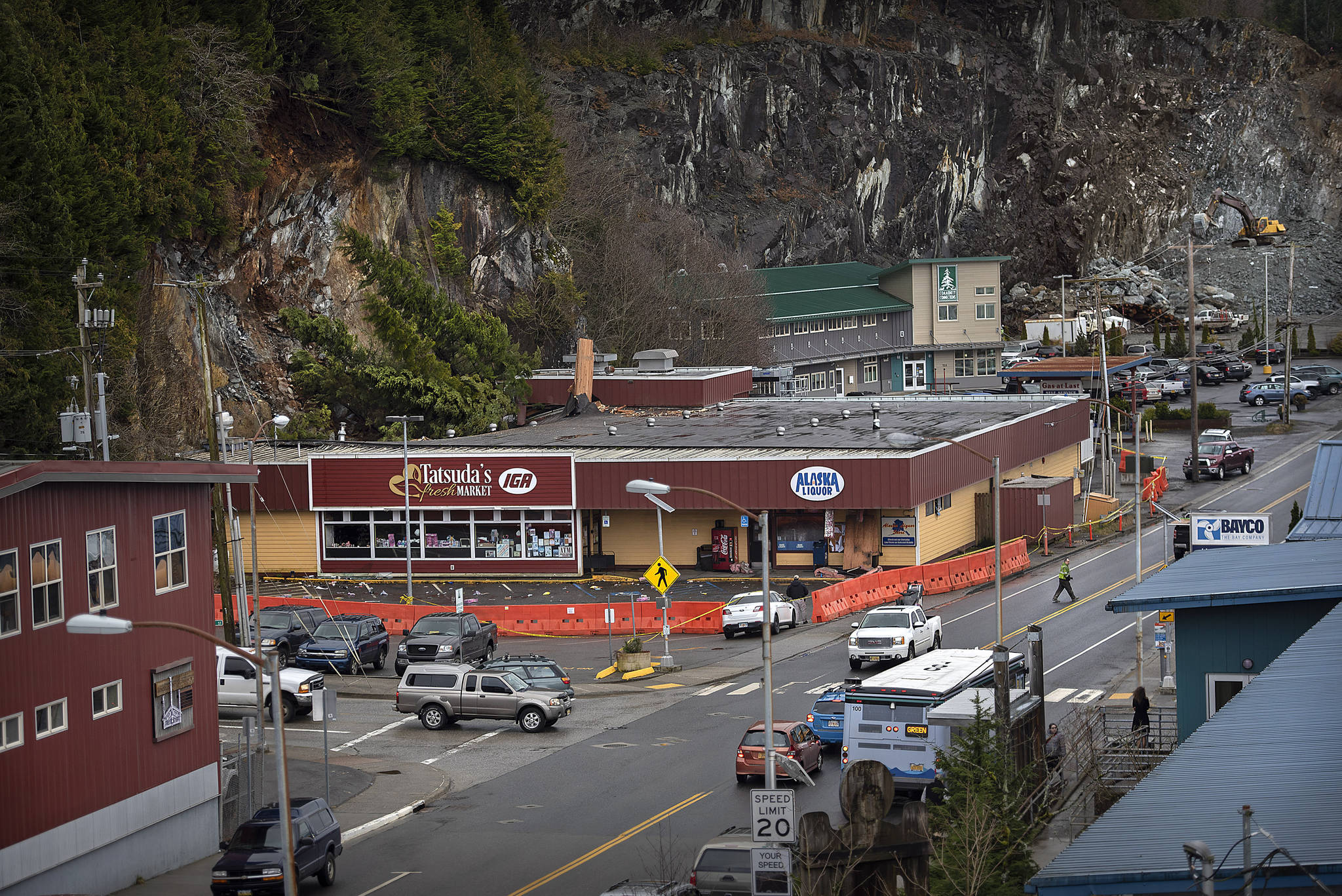 The Tatsuda’s IGA building in Ketchikan, Alaska was condemned Feb. 27, 2020 after it was struck early Thursday morning by a rockslide. The main portion of the slide hit the northeast corner of the building which collapsed part of the roof and ruptured a water main causing extensive damage to both the interior and exterior. (Dustin Safranek/Ketchikan Daily News via AP)