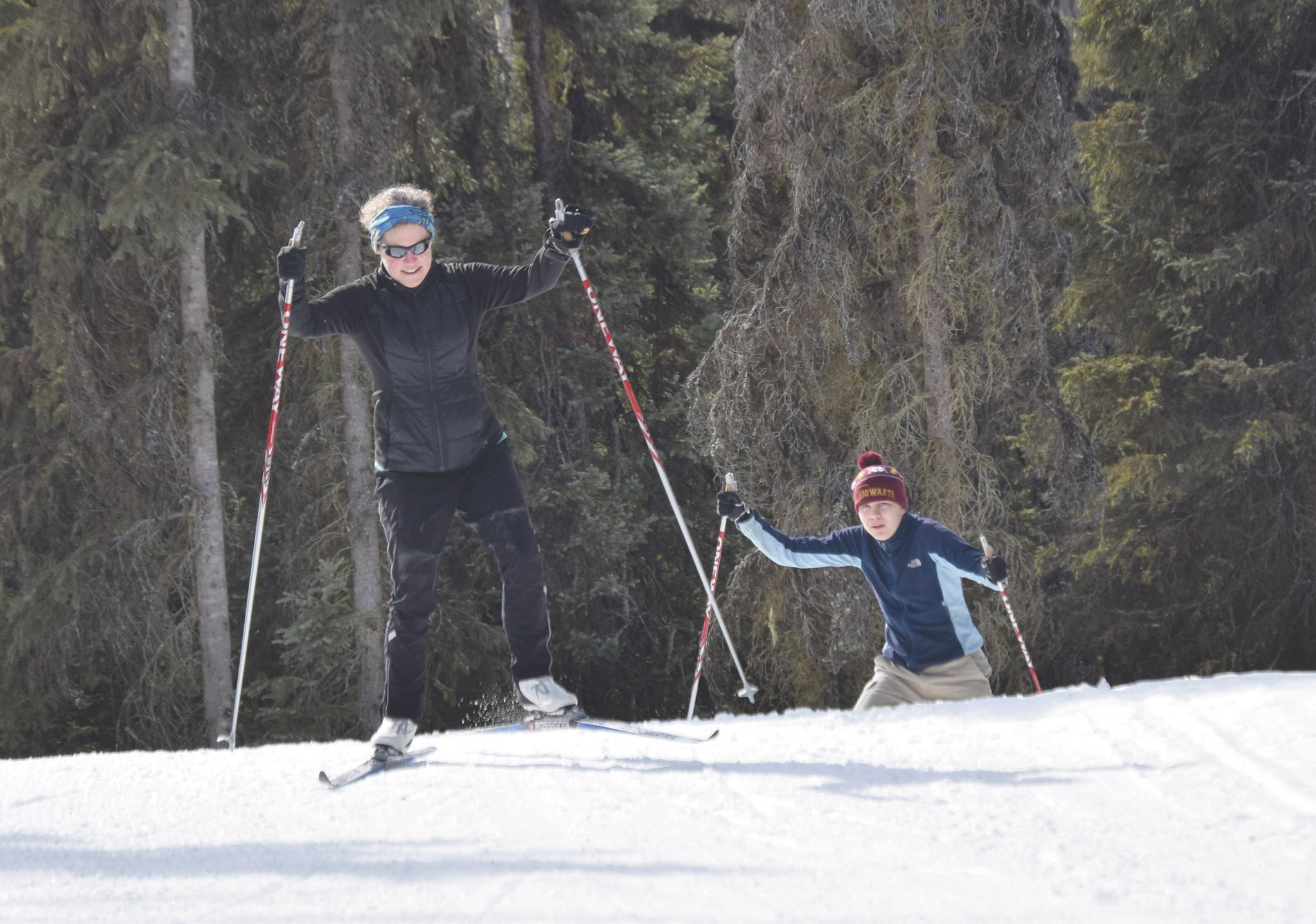 Soldotna’s Sheryl Nelson and her son, Robert, ski at Tsalteshi Trails on Tuesday, March 31, 2020, just outside of Soldotna, Alaska. (Photo by Jeff Helminiak/Peninsula Clarion)