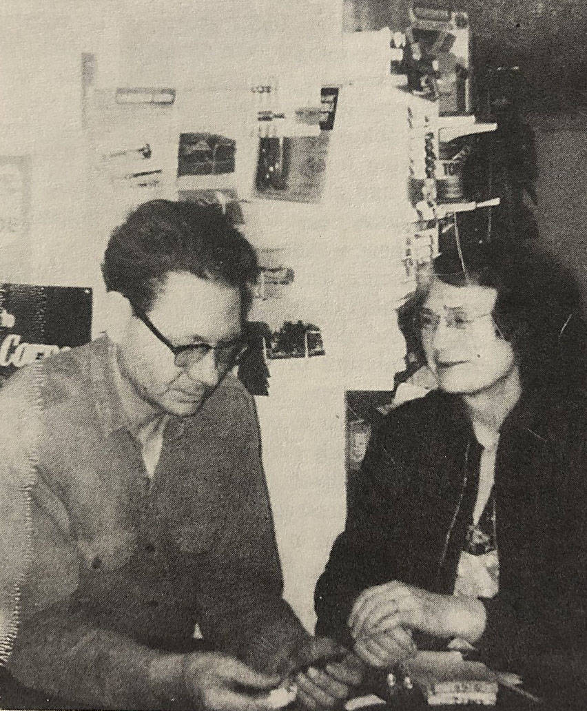 Photo provided by Mona Painter
Walter and Beverly Christensen are shown in a newspaper photo in their Clam Gulch store and post office, probably in the 1960s.