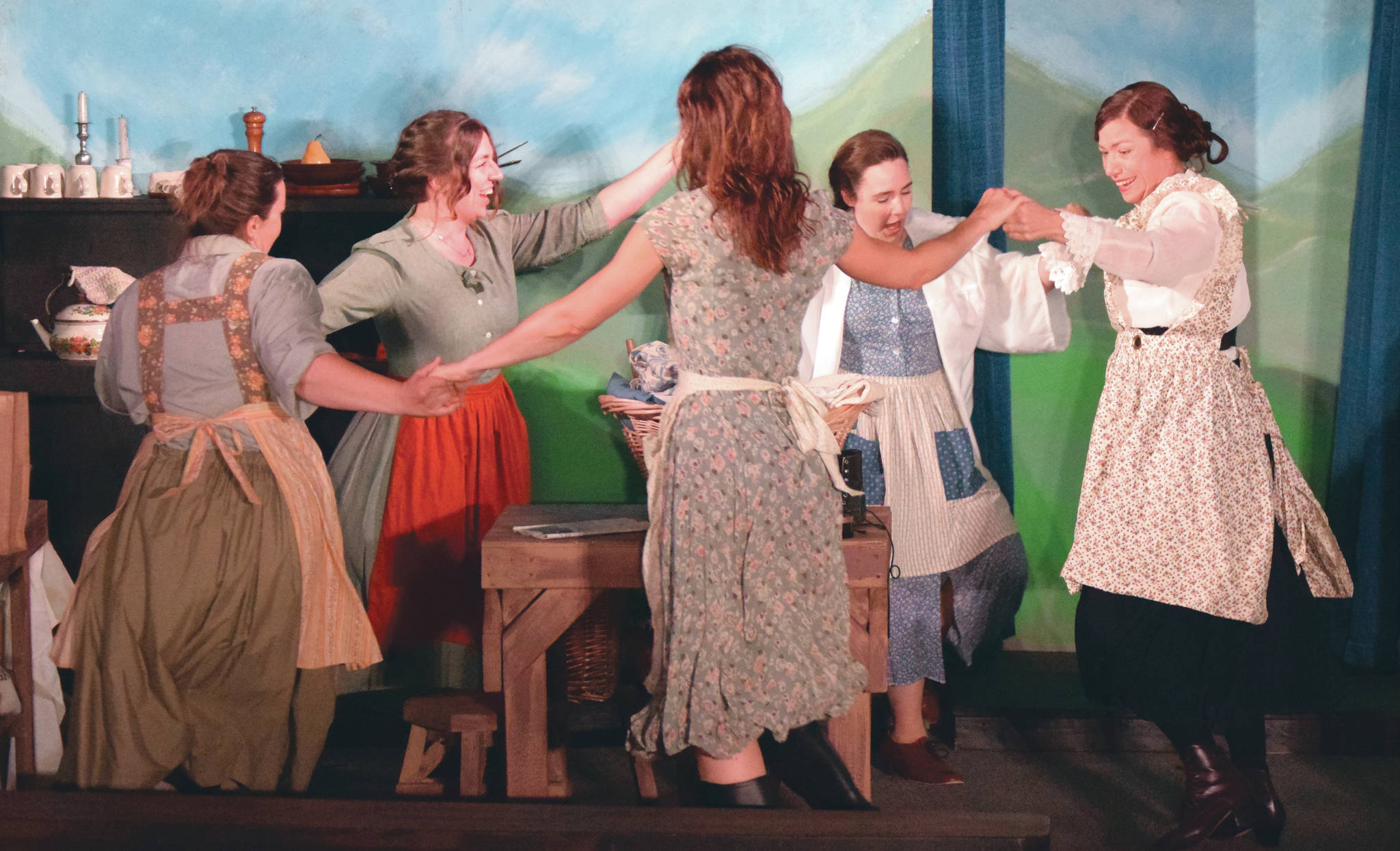 Jeff Helminiak/Peninsula Clarion                                The Mundy sisters (played by Kelsey Short, Hannah Tauriainen, Krista Plachta, Selia Butler and Amy Burton) dance during rehearsal for the Kenai Performers’ production of “Dancing at Lughnasa” on Monday at the Performers’ studio.