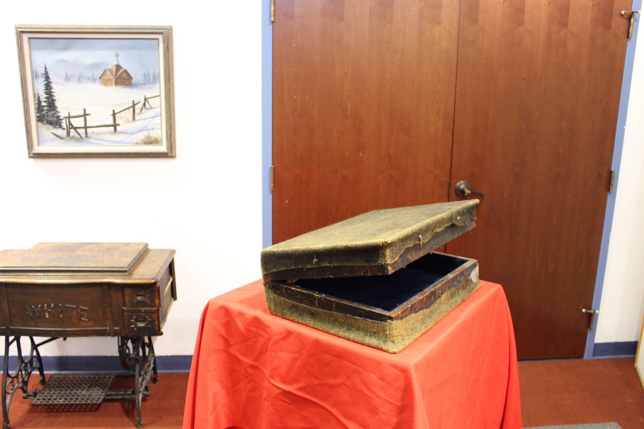 The suitcase of Igumen Nikolai, who traveled to the Kenai Peninsula in the late 1800s, is seen here on display at the Kenai Visitor and Cultural Center on Sept. 4, 2020. (Photo by Brian Mazurek/Peninsula Clarion)