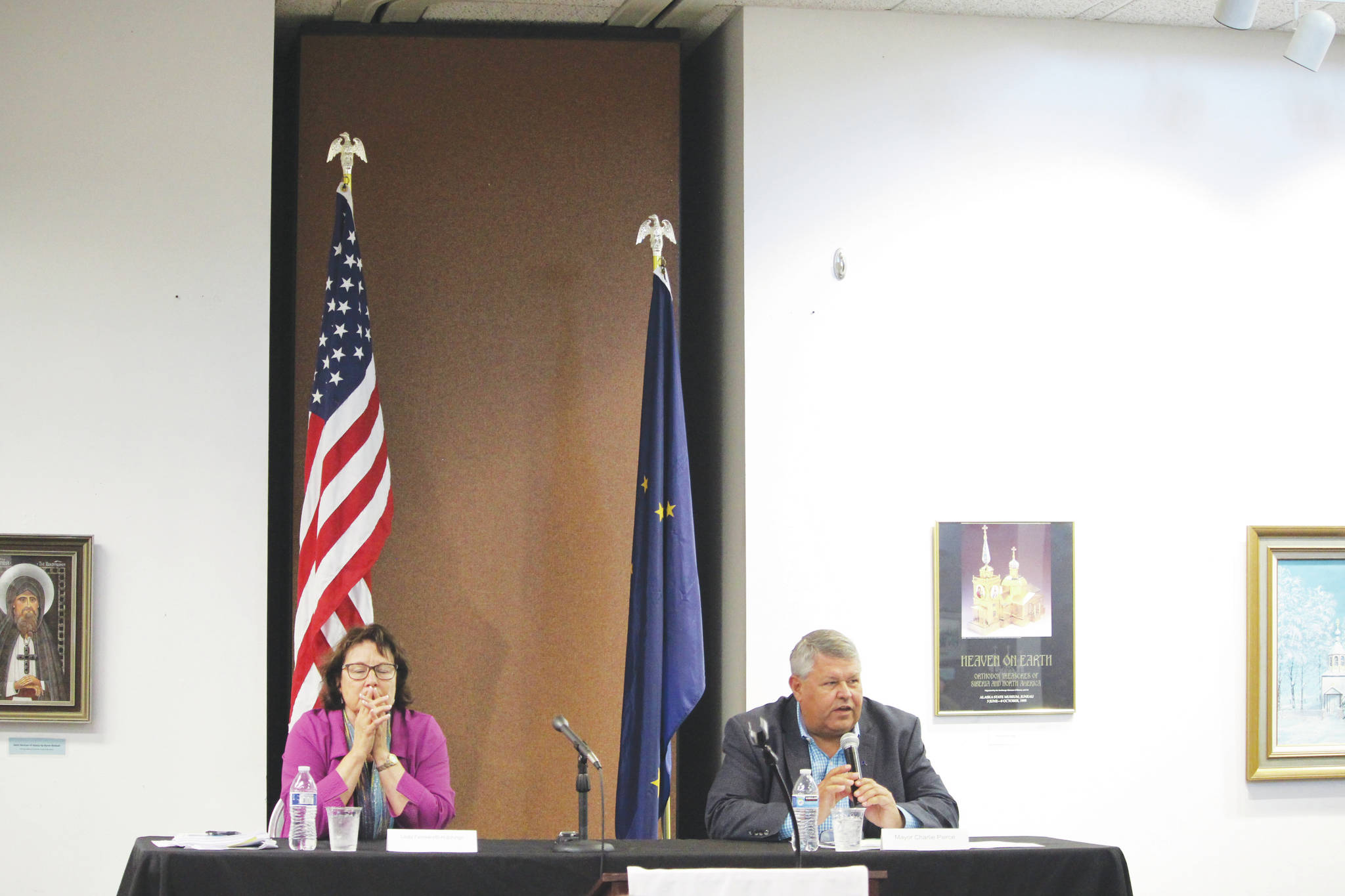 Brian Mazurek / Peninsula Clarion                                Linda Farnsworth-Hutchings and Kenai Peninsula Borough Mayor Charlie Pierce participate in a mayoral candidate forum Wednesday hosted by the Kenai Chamber of Commerce at the Kenai Visitor and Cultural Center.