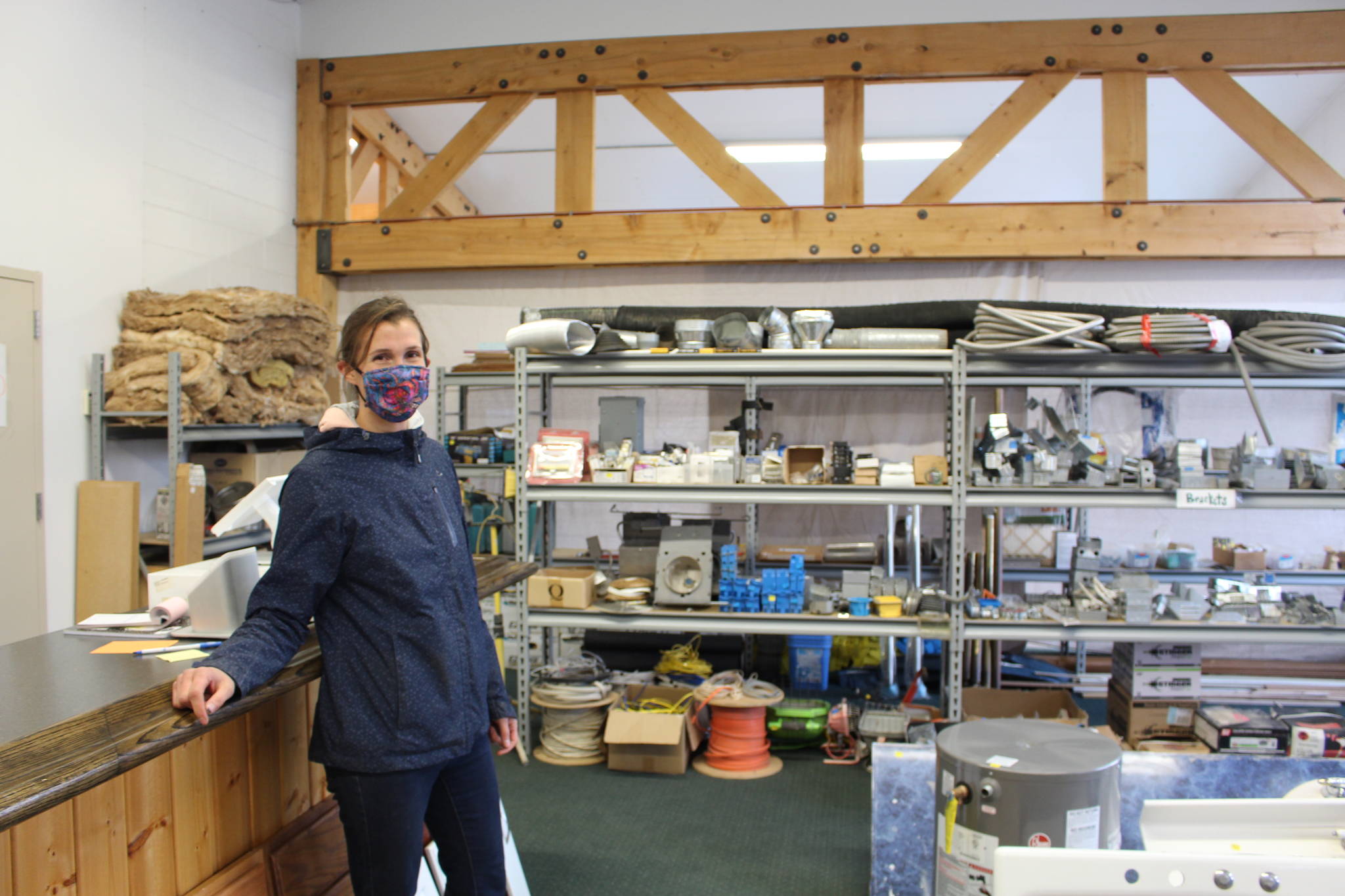 Amy Anderson, president and co-founder of BuildUP, a nonprofit thrift store for building materials, stands in the new BuildUP space that was leased thanks to the money donated by the Soldotna 100+ Women Who Care group on Sept. 24, 2020. (Photo by Brian Mazurek/Peninsula Clarion)