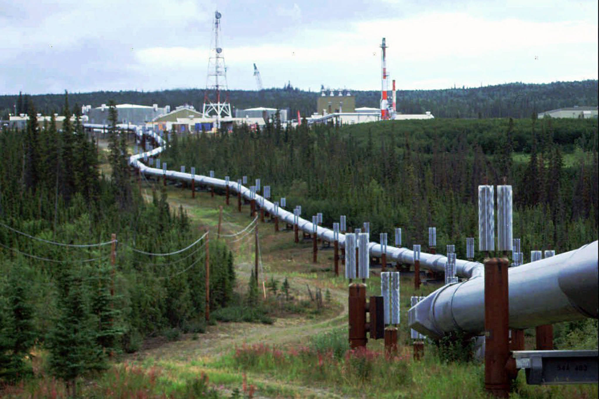 This undated file photo shows the Trans-Alaska pipeline and pump station north of Fairbanks, Alaska. (AP Photo/Al Grillo, File)