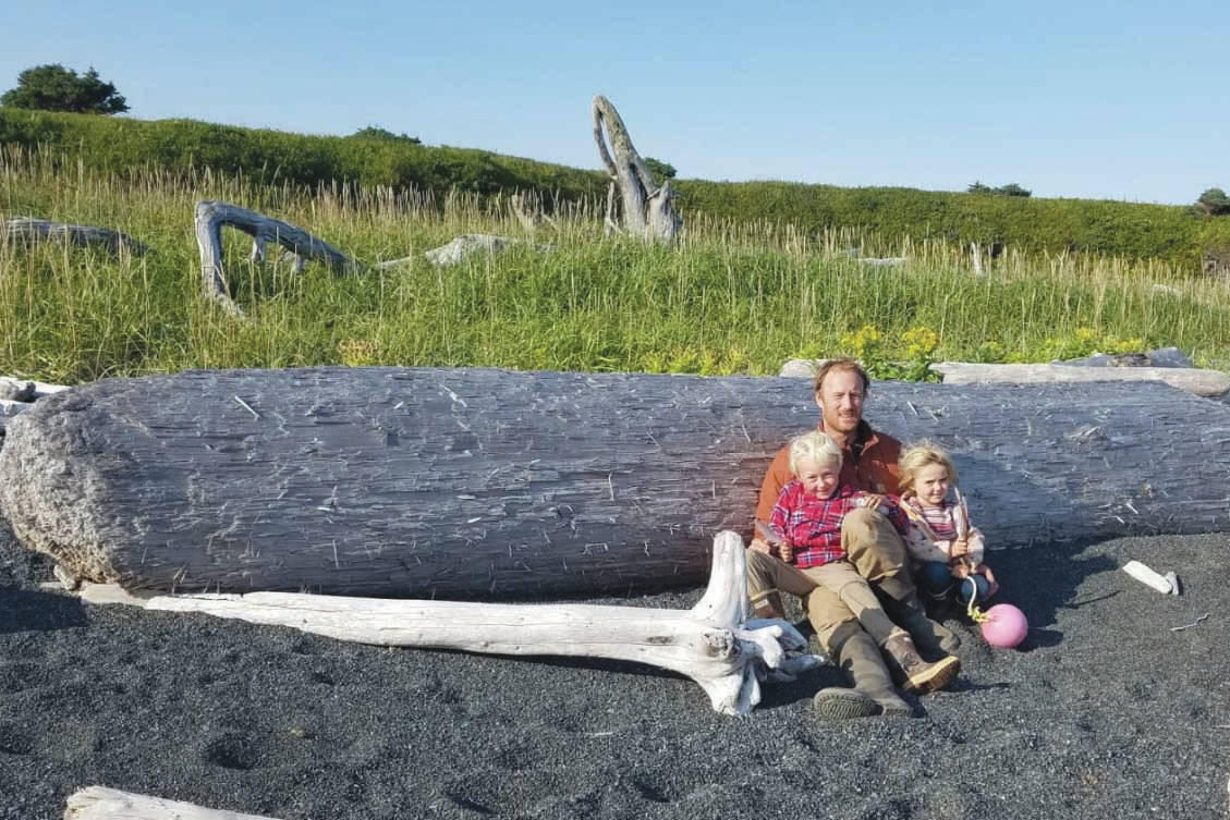 Eivin Kilcher with his children and their flotsam treasures on Ushagat Island in August 2020. (Photo by Eve Kilcher)