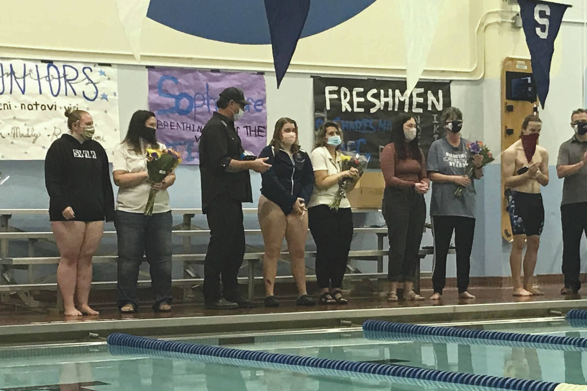 Soldotna High School senior swimmers are honored Oct. 30, 2020, at Soldotna High School. The seniors, from left to right, are Nathan Pitka, Emma Snyer, Deloma Watkins, Kat Gross and Brandon Christenson. (Photo provided by Luke Herman)