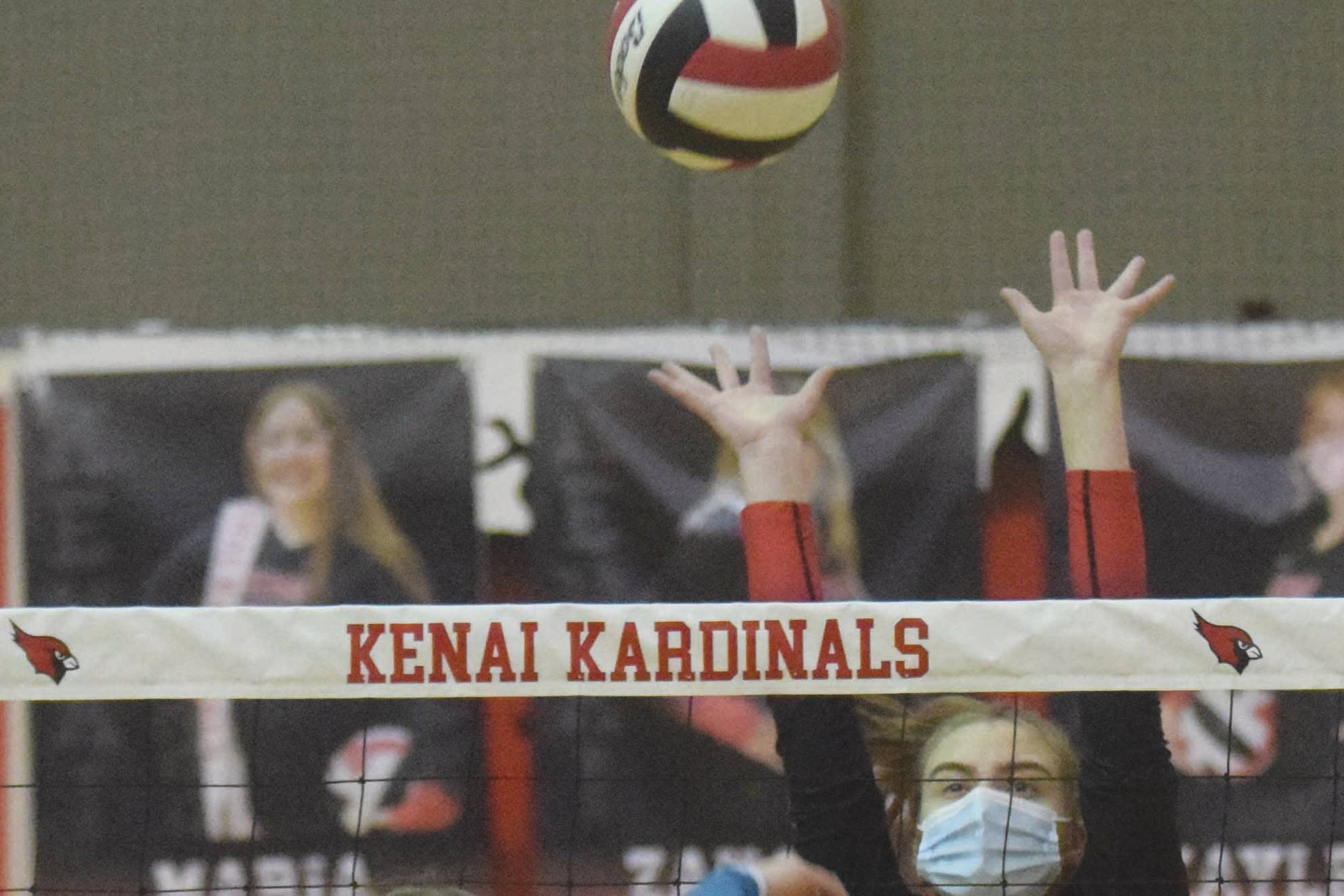 Kenai Central's Erin Koziczkowski puts up a block on Nikiski's Camry Ellis on Thursday, Nov. 5, 2020, at Kenai Central High School in Kenai, Alaska. (Photo by Jeff Helminiak/Peninsula Clarion)