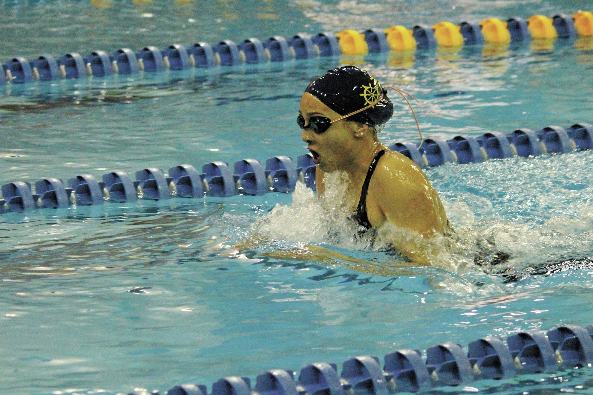 Homer senior Madison Story swims the breaststroke in the girls 200-yard IM on Saturday, Nov. 14, 2020 during the Kenai Peninsula Swimming Championships at the Kate Kuhns Aquatic Center in Homer, Alaska. (Photo by Megan Pacer/Homer News)