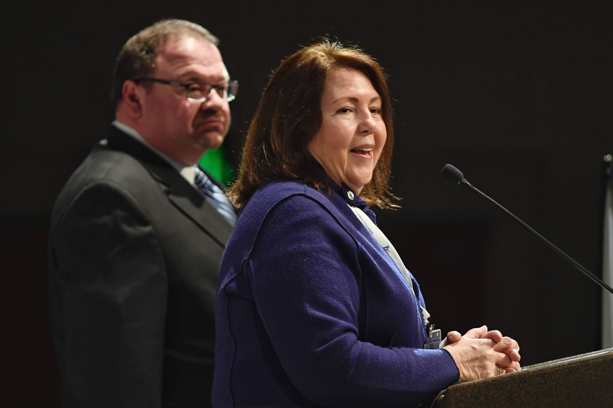 Julie Anderson, commissioner of the Department of Commerce, Community & Economic Development, speaks to the Alaska Chamber of Commerce at Centennial Hall on Thursday, Jan. 31, 2019. With Anderson on stage Curtis Thayer, President and CEO of the Alaska Chamber. (Michael Penn | Juneau Empire)