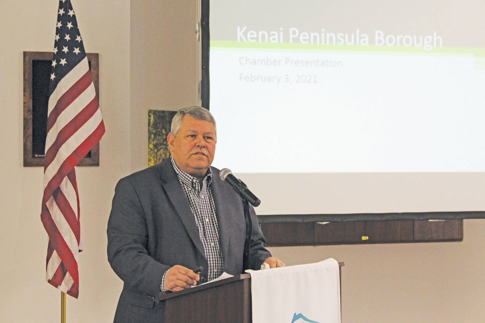 Kenai Peninsula Borough Mayor Charlie Pierce gives a presentation to members of the Kenai and Soldotna Chambers of Commerce at the Kenai Visitors and Cultural Center in Kenai, Alaska, on Feb. 3, 2021. (Photo by Brian Mazurek/Peninsula Clarion)