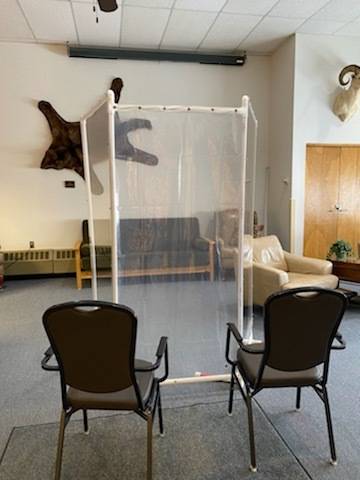 A partition is set up inside Heritage Place Skilled Nursing facility. Partitions have been used to separate residents from visitors due to COVID-19 protocols. (Photo courtesy Sandi Crawford)