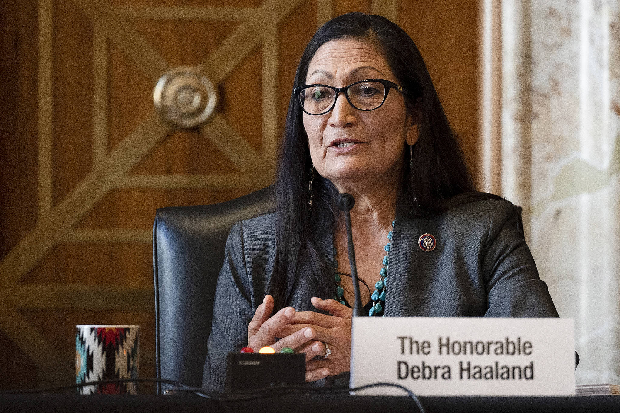 Jim Watson / Pool via AP
In this Feb. 23 file photo Interior Secretary nominee Rep. Deb Haaland, D-N.M., speaks during her confirmation hearing on Capitol Hill on Feb. 23.