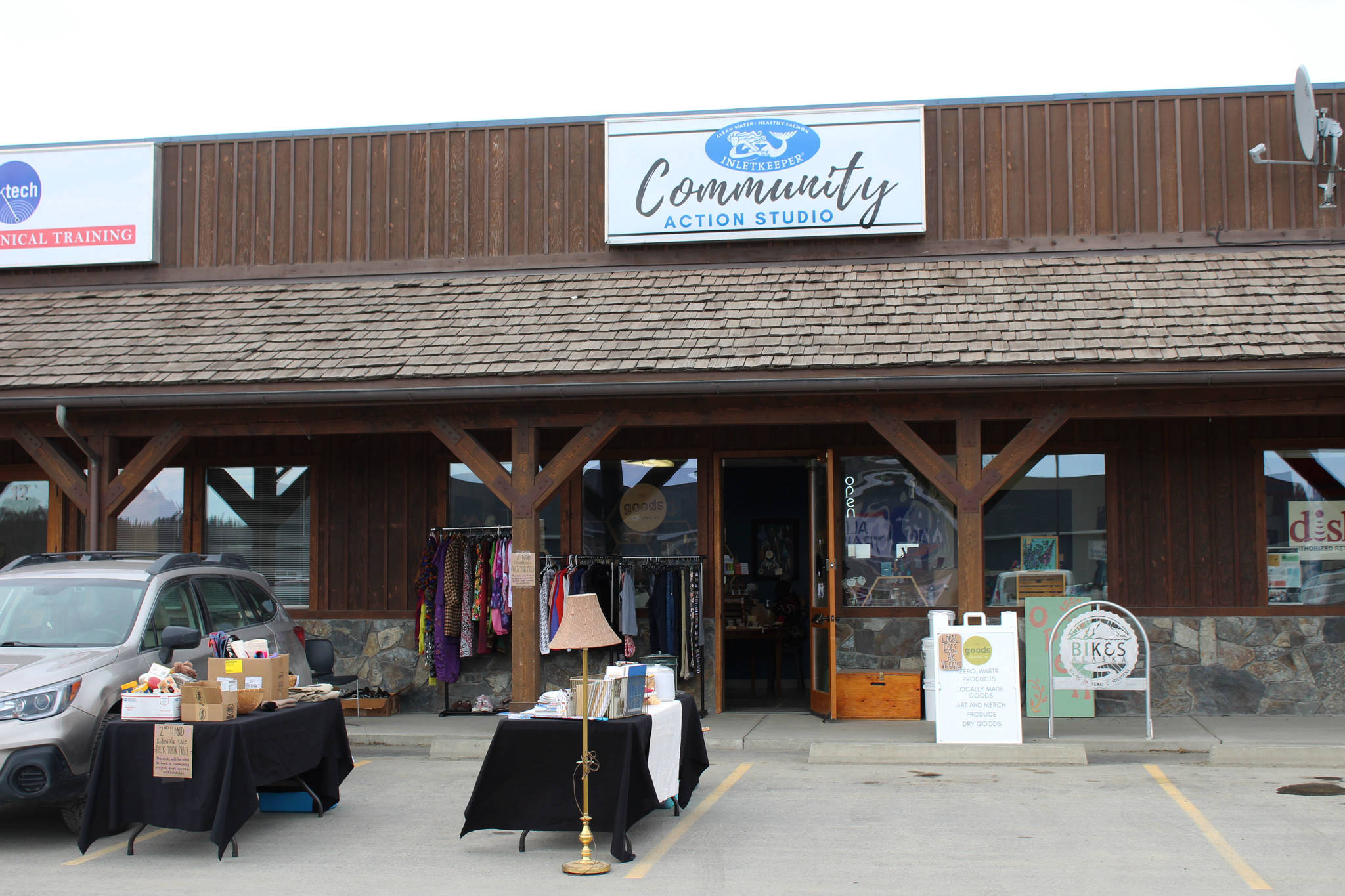 A second hand sidwalk sale is seen outside of Cook Inletkeeper’s Community Action Studio on Thursday, April 22, 2021 in Soldotna, Alaska. (Ashlyn O’Hara/Peninsula Clarion)