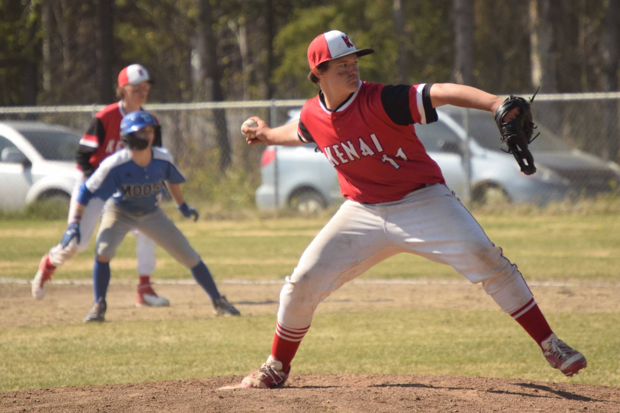 Kenai pitcher Gabe Smith delivers to Palmer on Thursday, May 27, 2021, at the Southcentral Conference tournament at the Soldotna Little League fields in Soldotna, Alaska. (Photo by Jeff Helminiak/Peninsula Clarion)