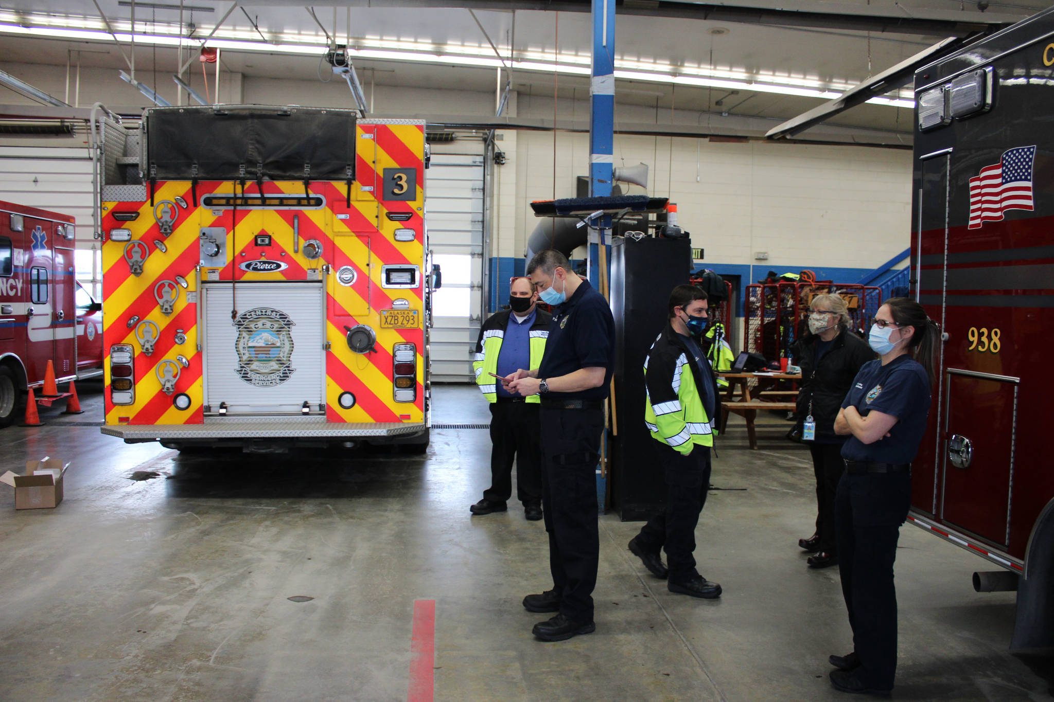 Central Emergency Services staff wait to receive doses of Pfizer’s COVID-19 vaccine on Dec. 18, 2020, in Soldotna, Alaska. (Ashlyn O’Hara/Peninsula Clarion)