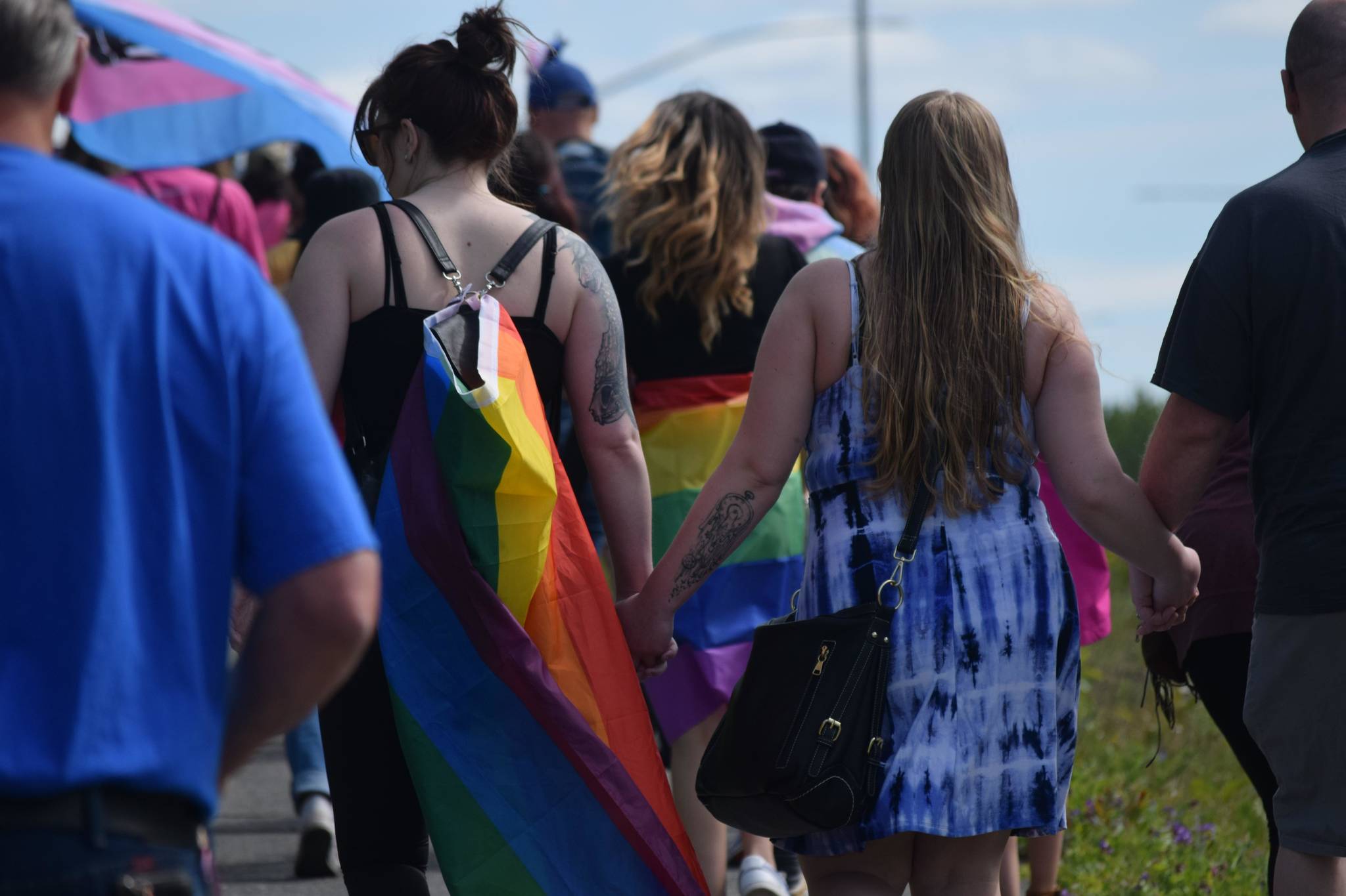 A group spanning the length of five blocks marches in downtown Soldotna, Alaska, to celebrate Pride Month on Saturday, June 12, 2021. (Camille Botello/Peninsula Clarion)