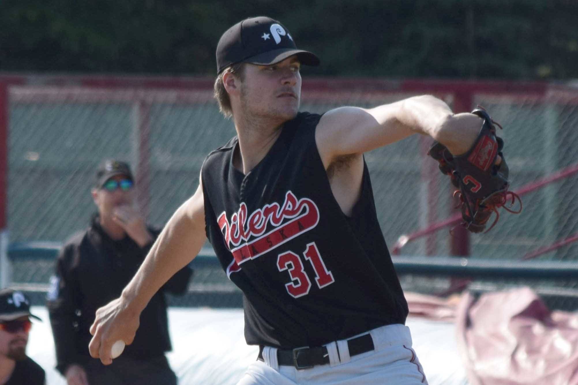 Oilers starting pitcher Luke Yacinich delivers home during the team's home game against the Chugiak Chinooks at Coral Seymour Memorial Park in Kenai, Alaska, on Wednesday, July 14, 2021. (Camille Botello / Peninsula Clarion)